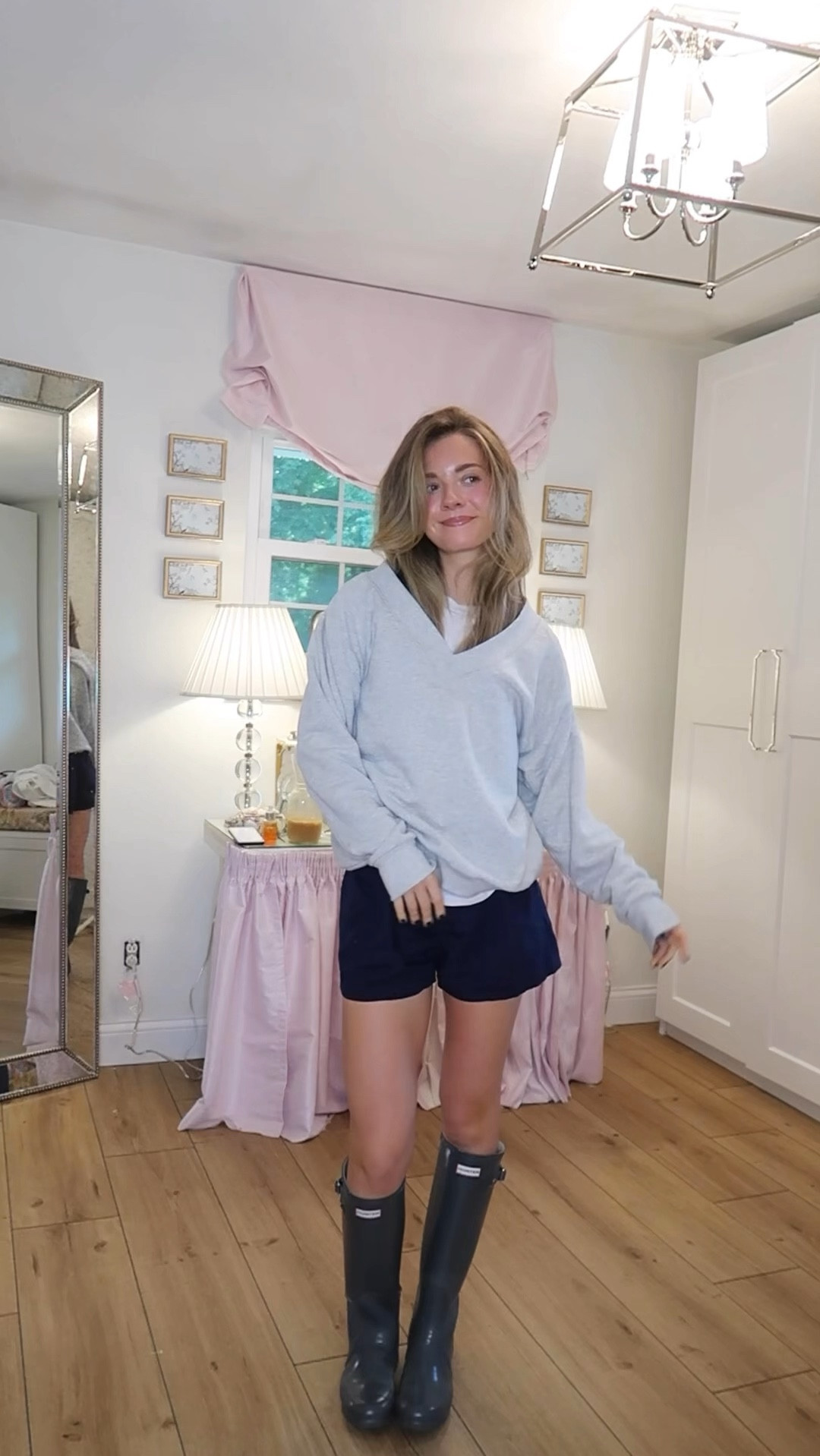 it poured rain today oof anyway - wearing a large in this v neck sweatshirt! Boxers were found in the pj section at Marshall’s and my hunters are from 2014 lol