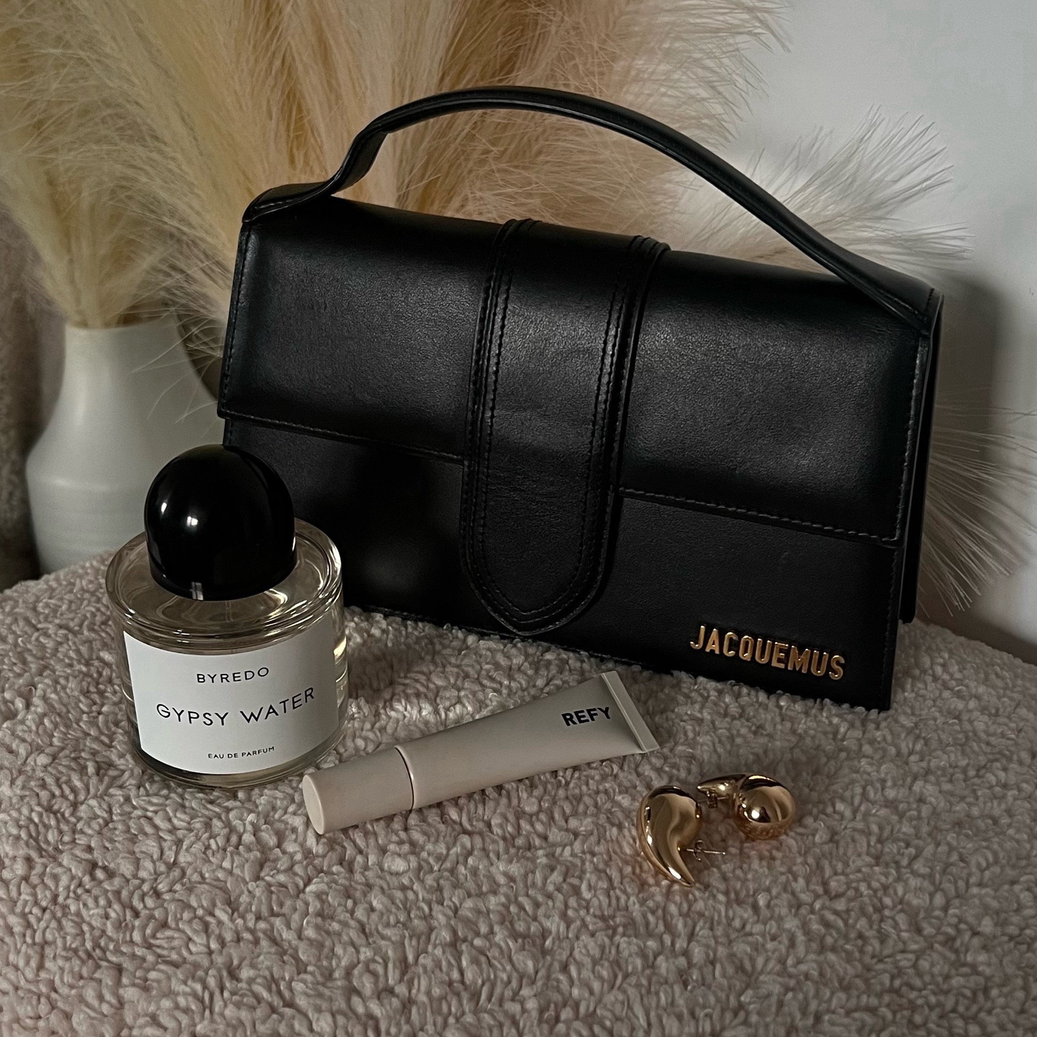 Current favourites🖤byredo gypsy water perfume, jacquemus bag, gold earrings, refy lipgloss #LTKxSpaceNK 

#LTKitbag #LTKbeauty