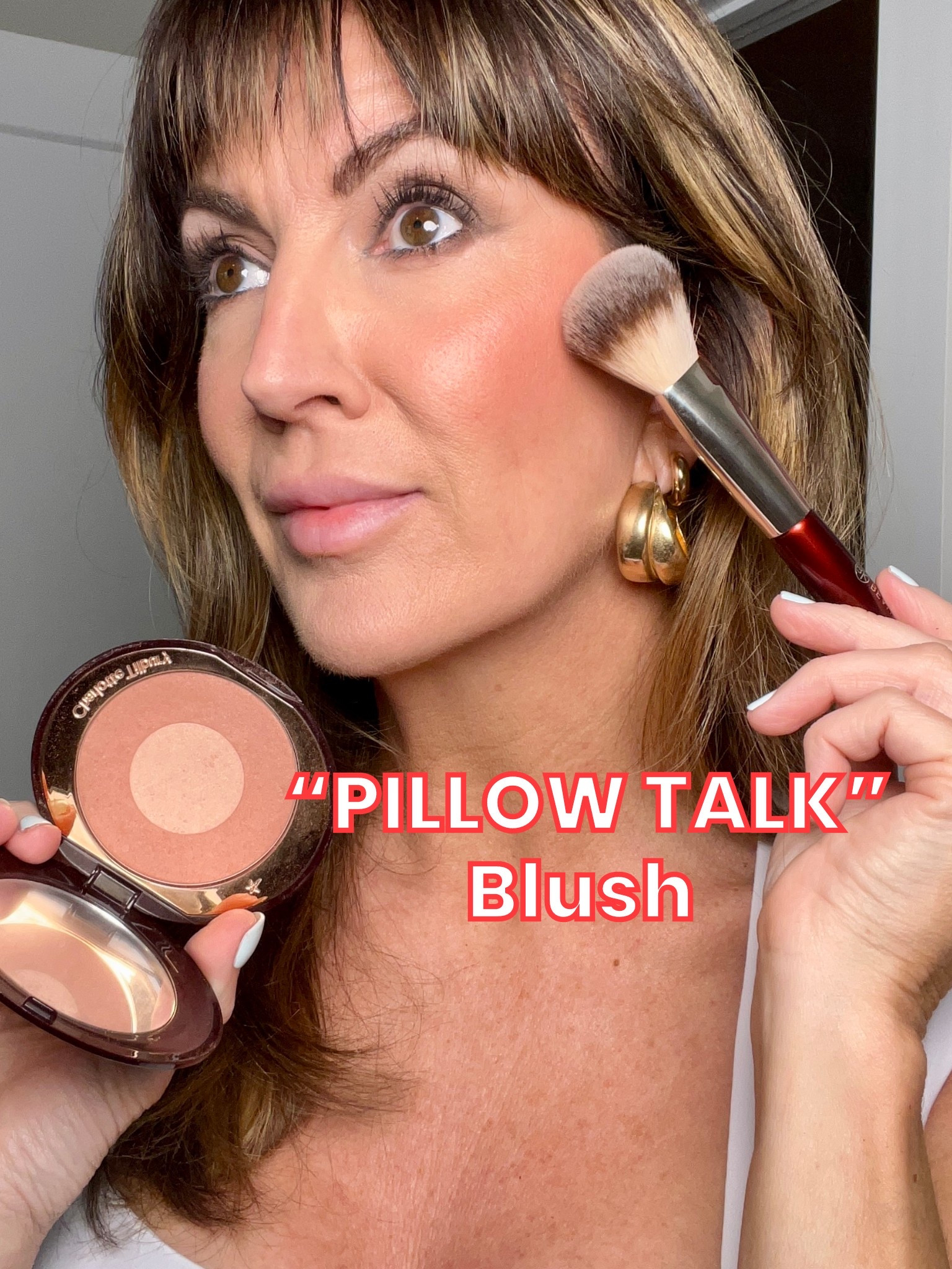 🤗One of my all time fave blushes that is SO flattering. The iconic “pillow talk” shade from Charlotte Tilbury! Has a tad bit of shimmer to it which enhances the warm glowy feel. 

#LTKOver40 #LTKgrwm #LTKBeauty