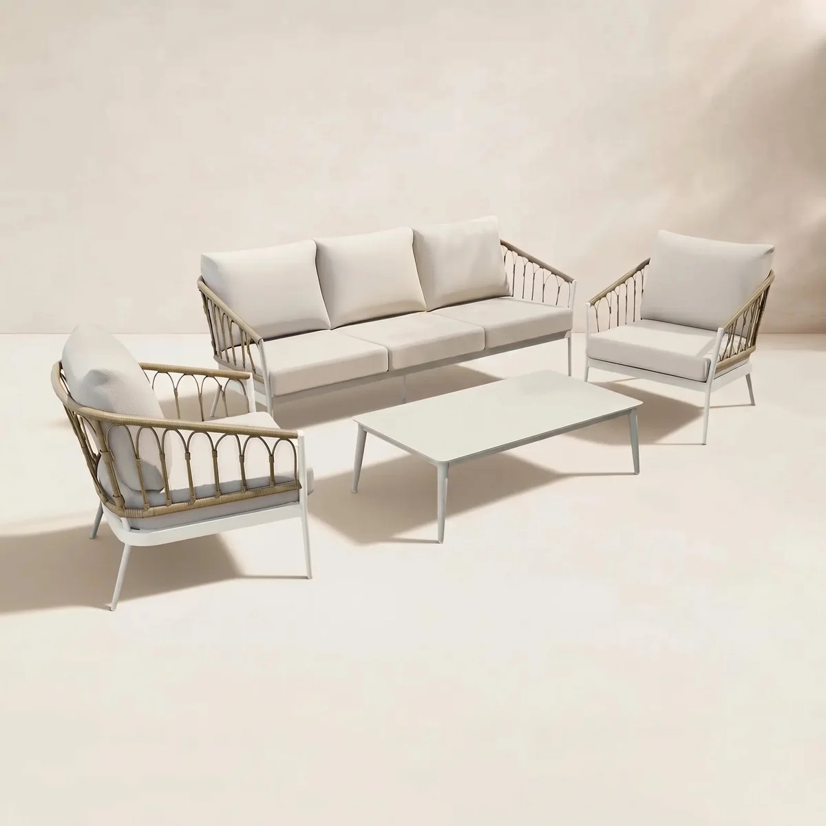 Silvie 4-Piece Wicker Patio Conversation Set With Coffee Table And Beige Cushions | Wayfair North America