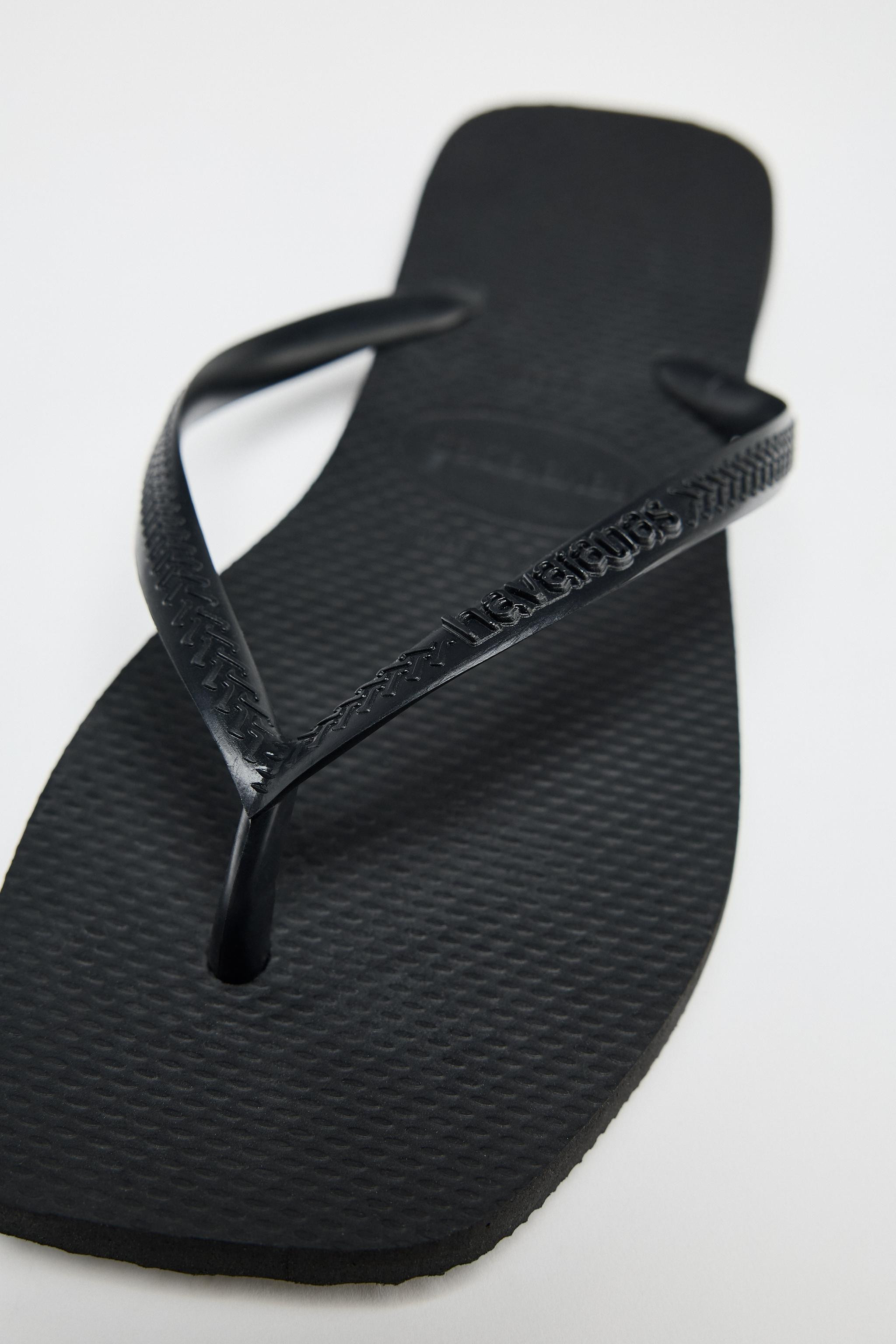 Flat sandal-style shoes. Front strap with toe post. Embossed sole. Square toe.Sole height: 1 cm /... | Zara UK