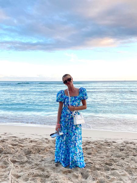 Pretty blue puff sleeve open back maxi dress  

#LTKwedding #LTKtravel #LTKSeasonal