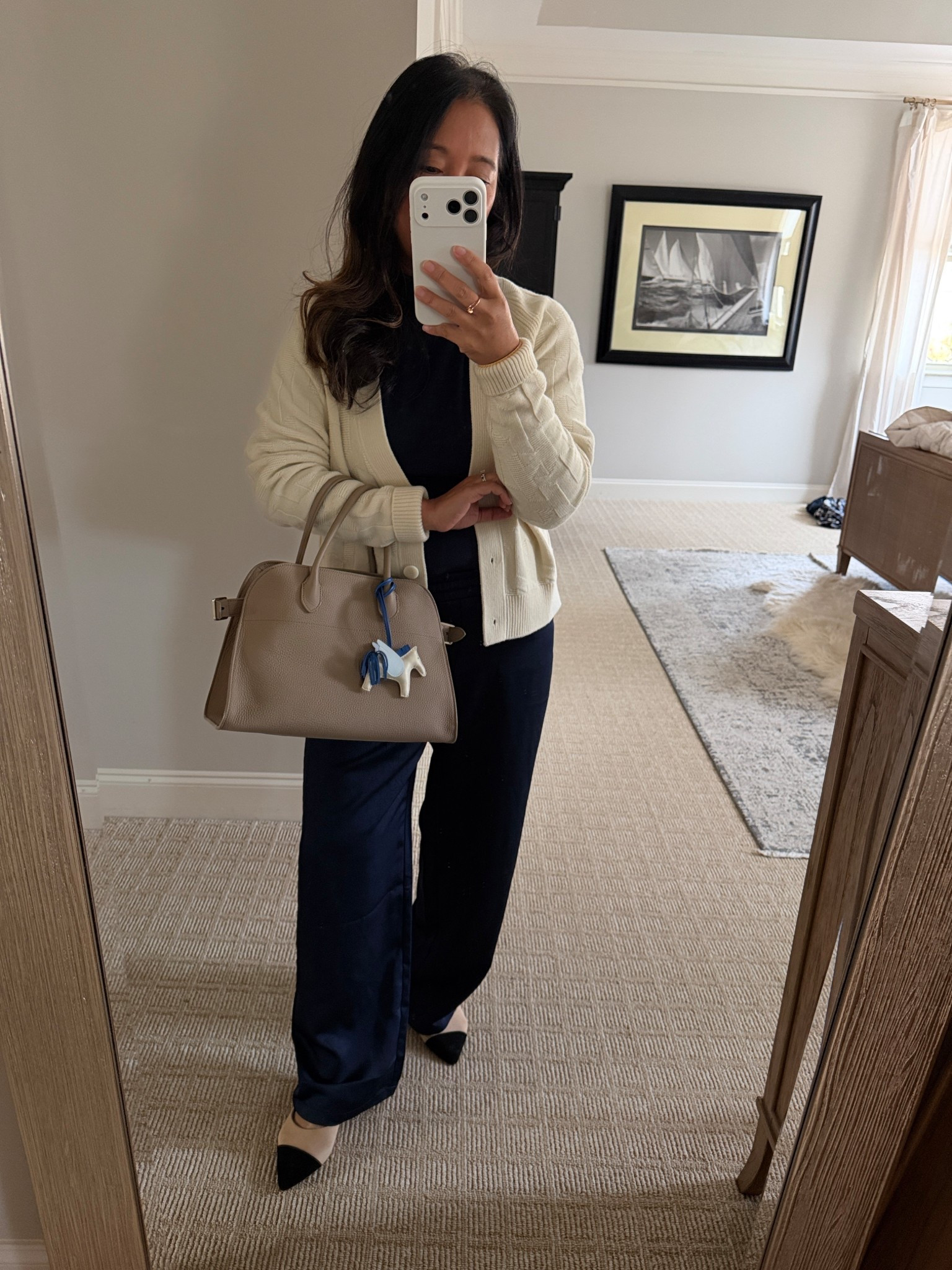 Classic style navy on navy with  creamy cardigan. 

1. Navy turtleneck I have worn for year! Medium for a relaxed look 

2. Satin pants -TTS 

3. Cashmere cardigan -the one is Hermes but linked up a very similar one! 

4. Cap toe pointy kitten heels 

#LTKootd #LTKPetite #LTKOver40