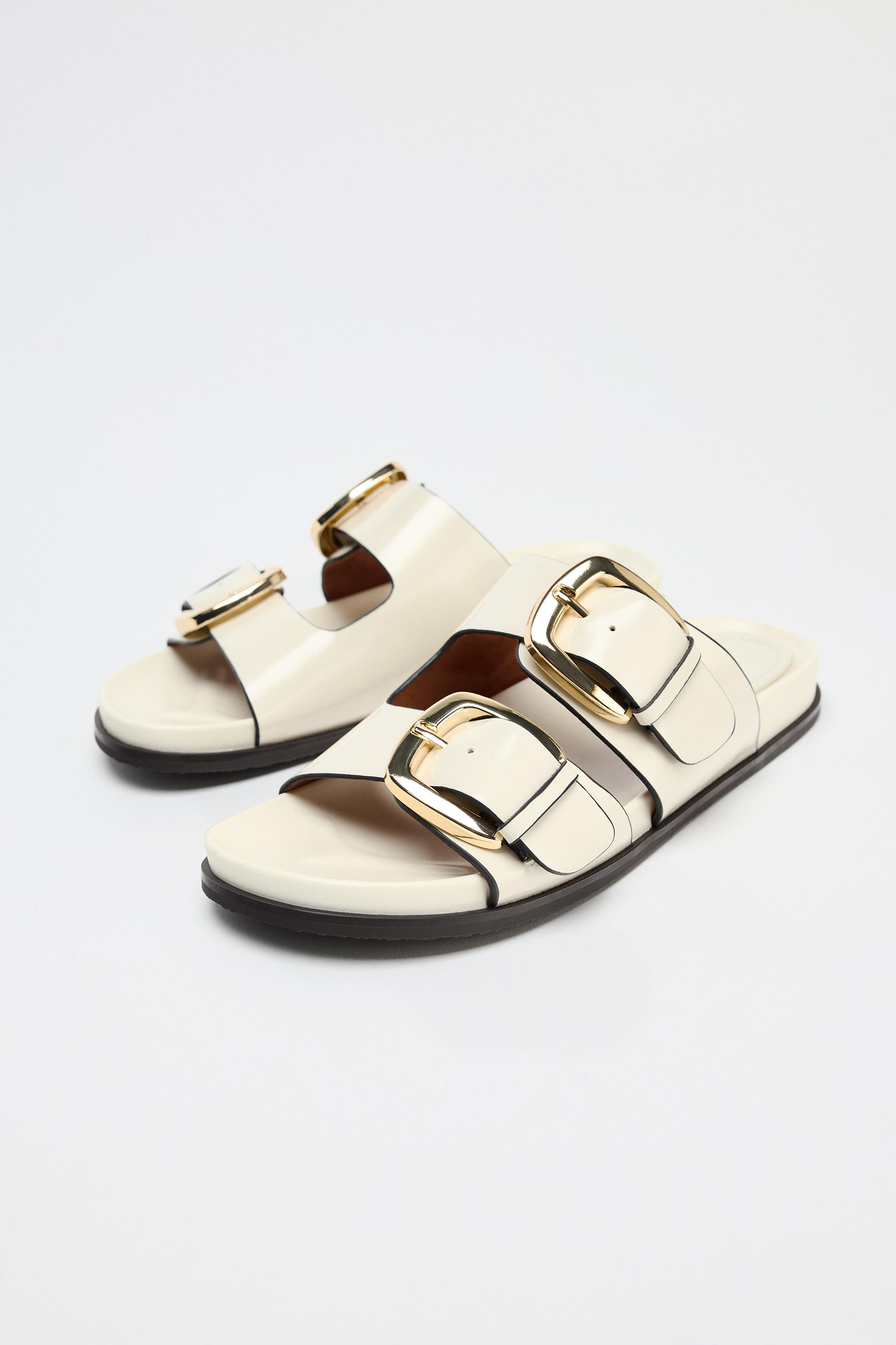Flat sandals. Double strap at the front with buckle. Rounded toe.Sole height: 0.4 inches (1 cm) | Zara US