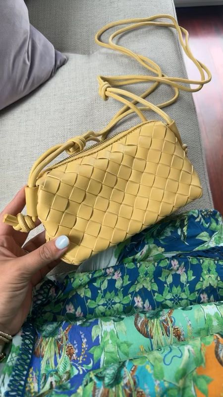 Just got this purse in, perfect summer bag & under $50! Wearing size XL in dress- use code CARALYN20 thru 5/12! 

#LTKItBag #LTKFindsUnder50 #LTKMidsize