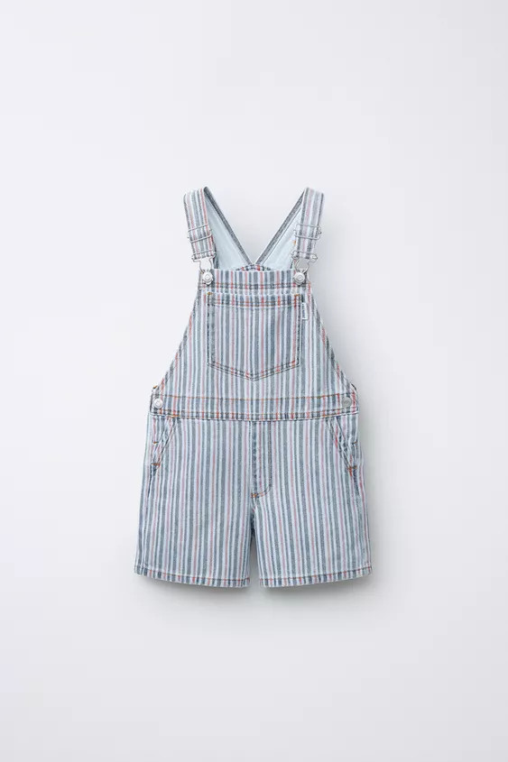Denim short dungarees with a straight neckline and front buckle fastening straps. Featuring front... | Zara UK
