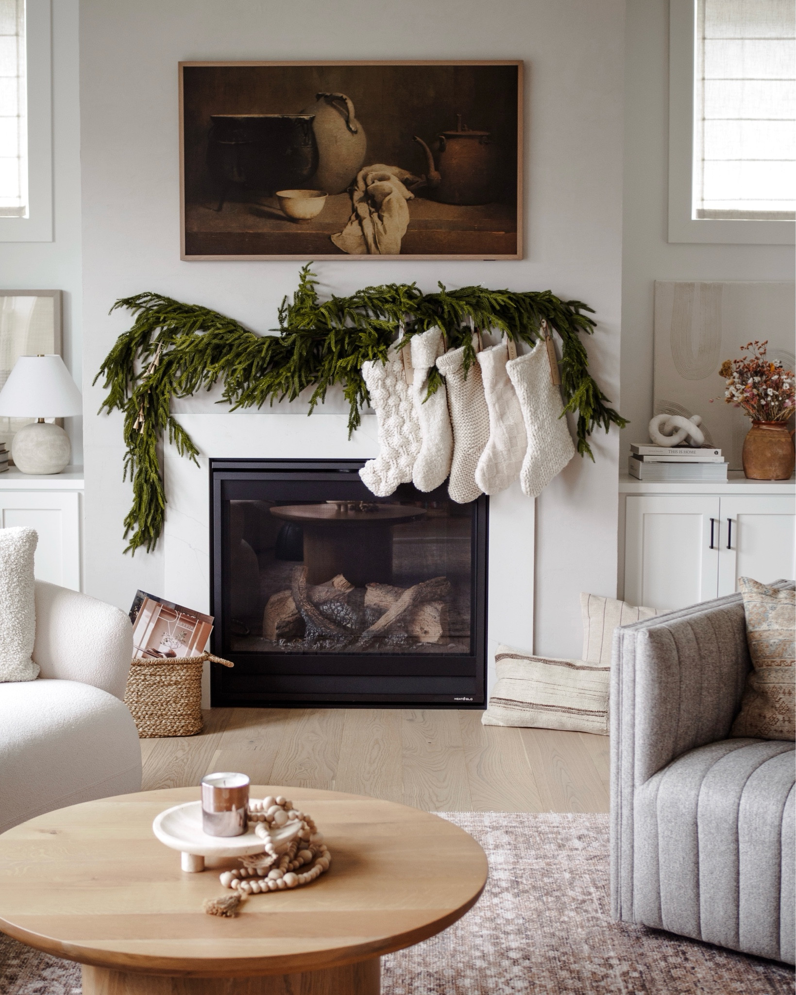 Christmas holiday season winter garland fireplace stockings modern home

#LTKSeasonal #LTKHoliday #LTKHome