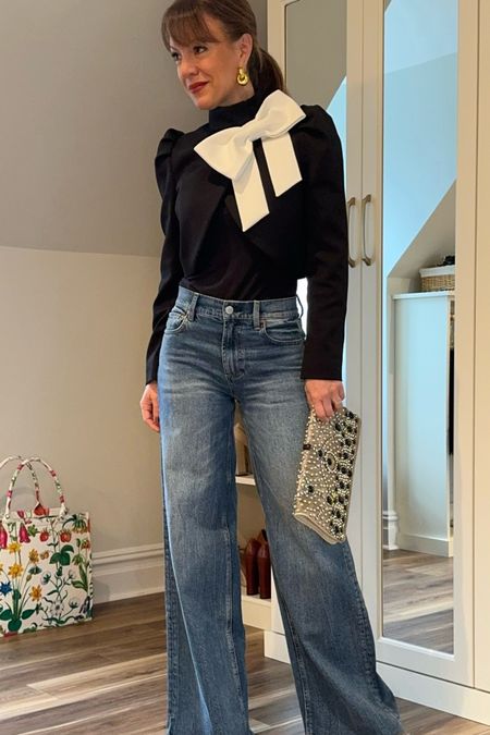 The cutest cropped bow sweater for spring - paired it with wide-leg jeans! 

#LTKstyletip