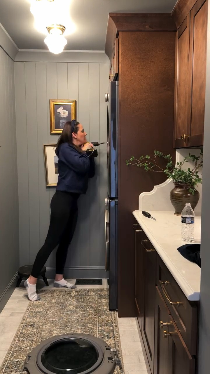 The space savings speaks for itself👏 but I gained so much functionality with being able to add both lower and upper cabinets along with a countertop and sink. Bonus, the lower cabinets are actually my pull out hampers! Pretty clever right????! 

Laundry room design, stacked washer and dryer, space saving laundry room designs, galley laundry room
