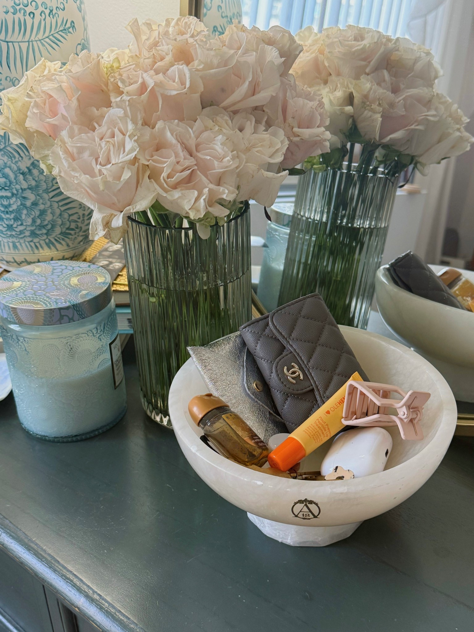Once my Anthropologie candle burned out, I turned this stunning bowl into a purse bowl!

What’s a purse bowl? It’s a place to empty out your purse after each day so that when you change handbags, you don’t forget anything!