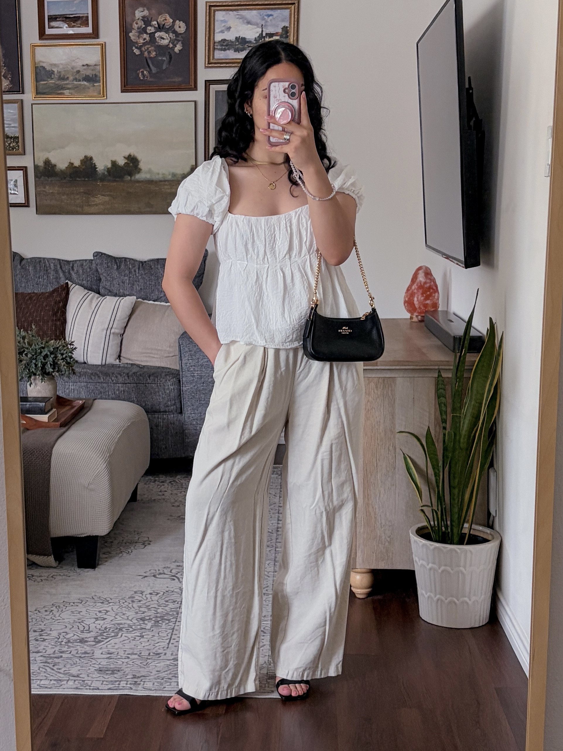1 out of 3 ways to style a white top for summer ☀️ white top outfit, white blouse outfit, summer outfit inspo, 3 ways to style a white top, styling basics, capsule wardrobe outfit, summer capsule wardrobe, linen pants outfit, black sandal heels outfit, black heels outfit, effortless summer style, chic summer outfit, elevated casual outfit, classy casual style, minimal summer outfit, neutral outfit inspo, coastal chic outfit, euro summer style, vacation outfit inspo, black coach bag outfit, layered gold necklaces, gold jewelry outfit, elegant summer look, timeless style, mix and match outfits, versatile outfit ideas, everyday chic outfit, ootd, outfit inspo, style inspo, fashion inspo 2026, Coach bag outfit  

 #LTKxAbercrombie #LTKdayinmylife #LTKgrwm