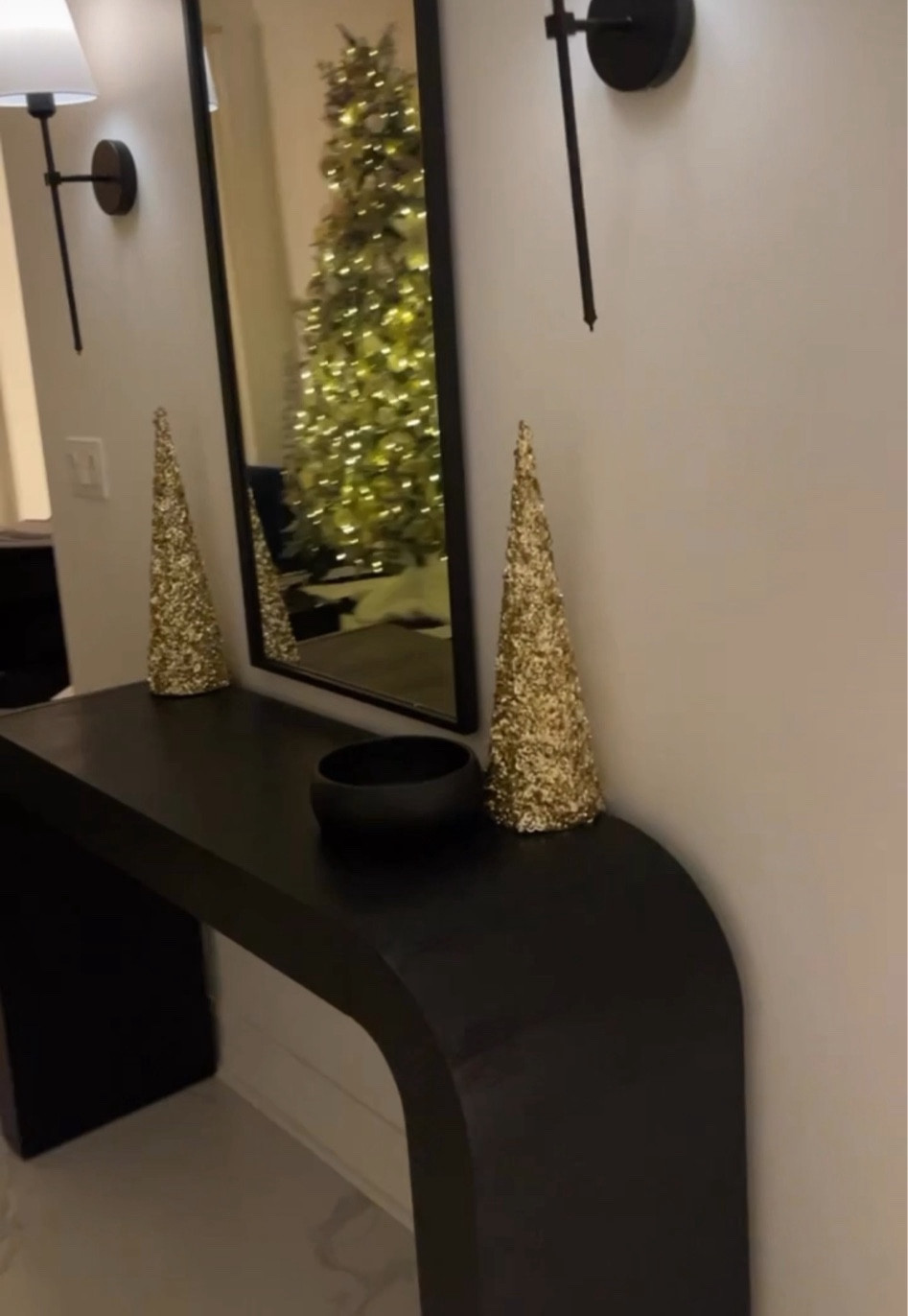Gorgeous modern waterfall console table setup🤩 battery operated sconces are a total game changer🙌🏻 

#LTKstyletip #LTKhome