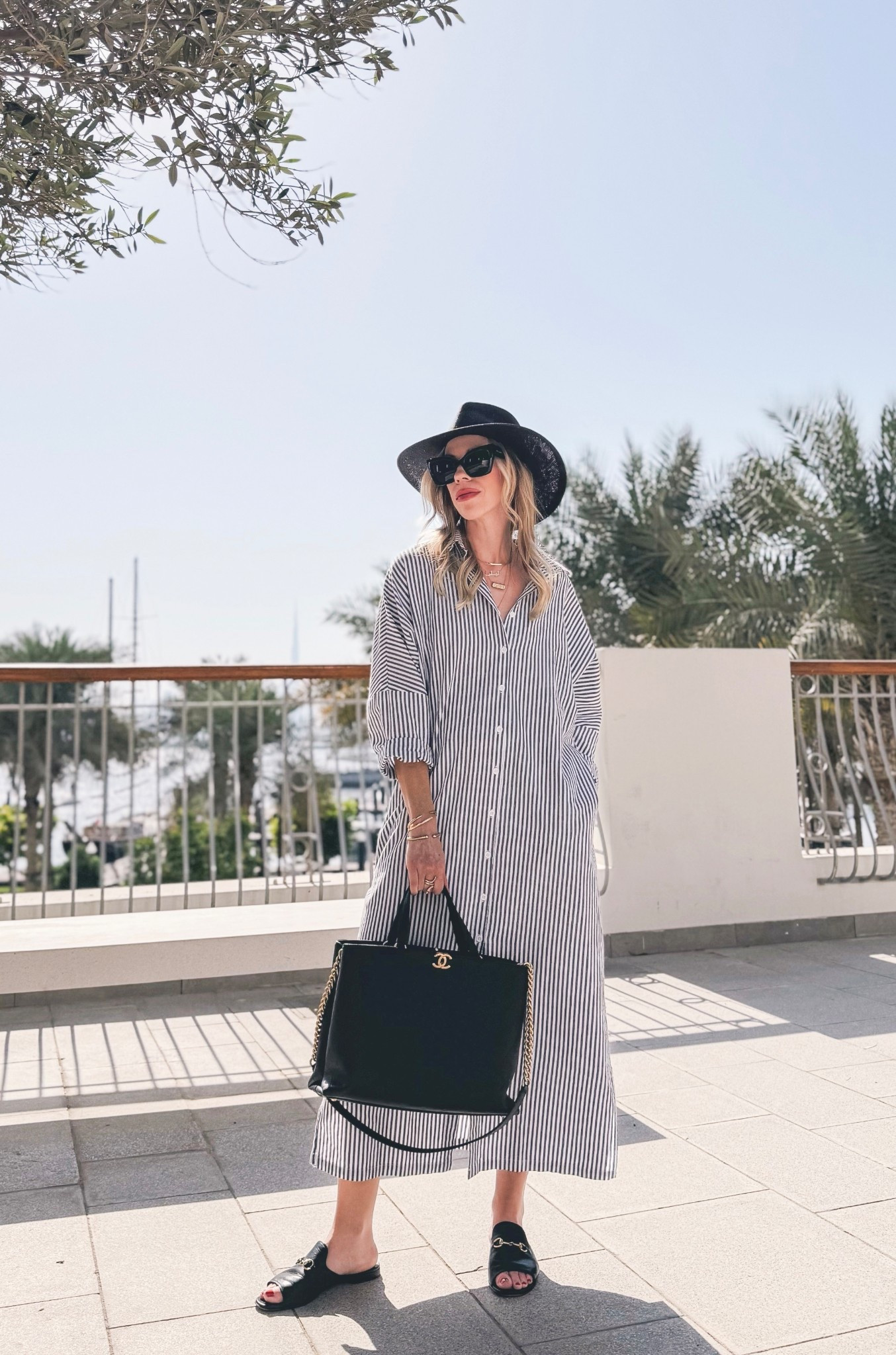 Vacation outfit, beach dress, striped linen dress, black straw hat

#LTKTravel #LTKSaleAlert #LTKOver40