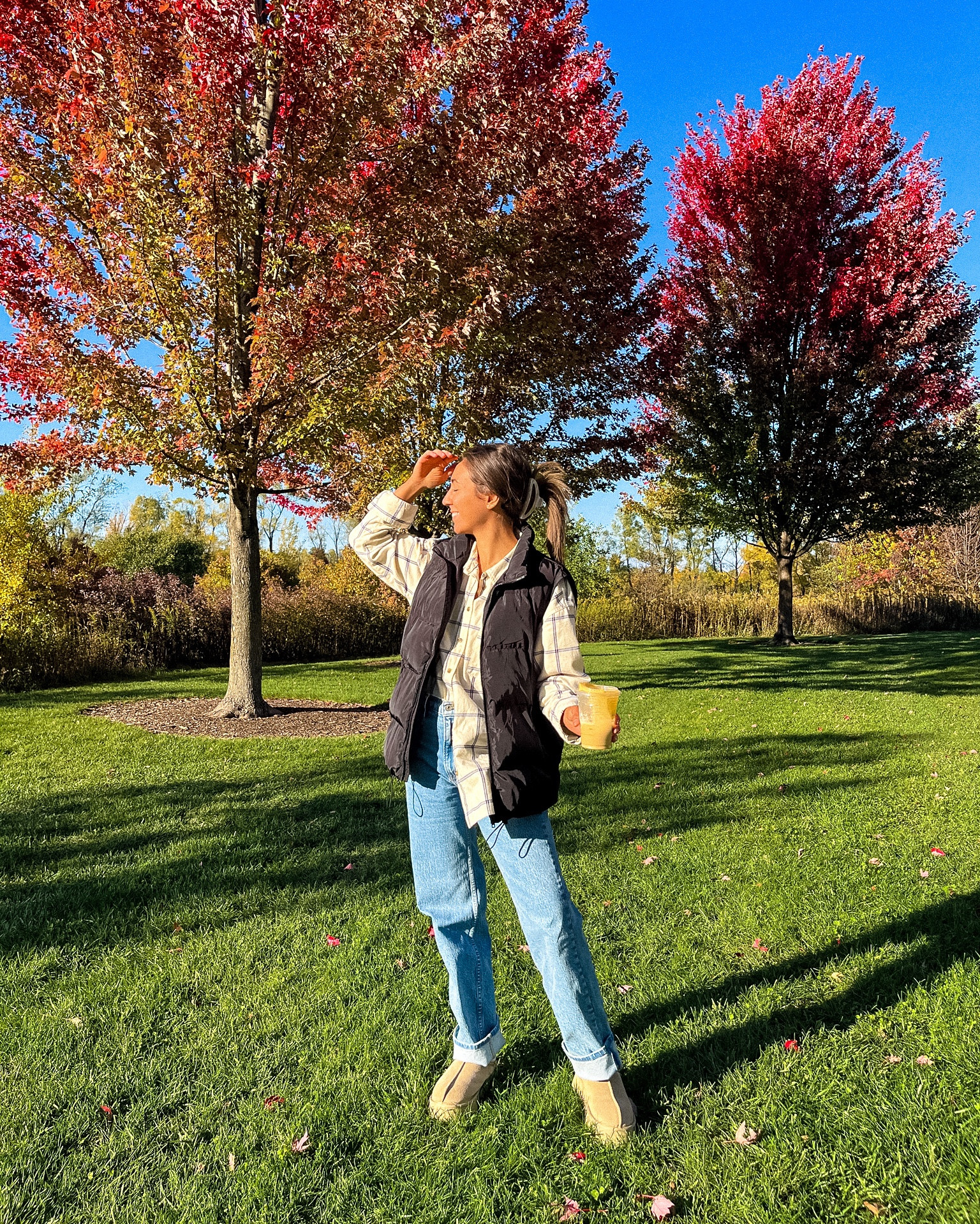 Casual Fall Fashion; Puffer Vest, Abercrombie Jeans, Flannel, Starbucks Coffee Pumpkin Chai, Claw Clip 

#LTKstyletip
