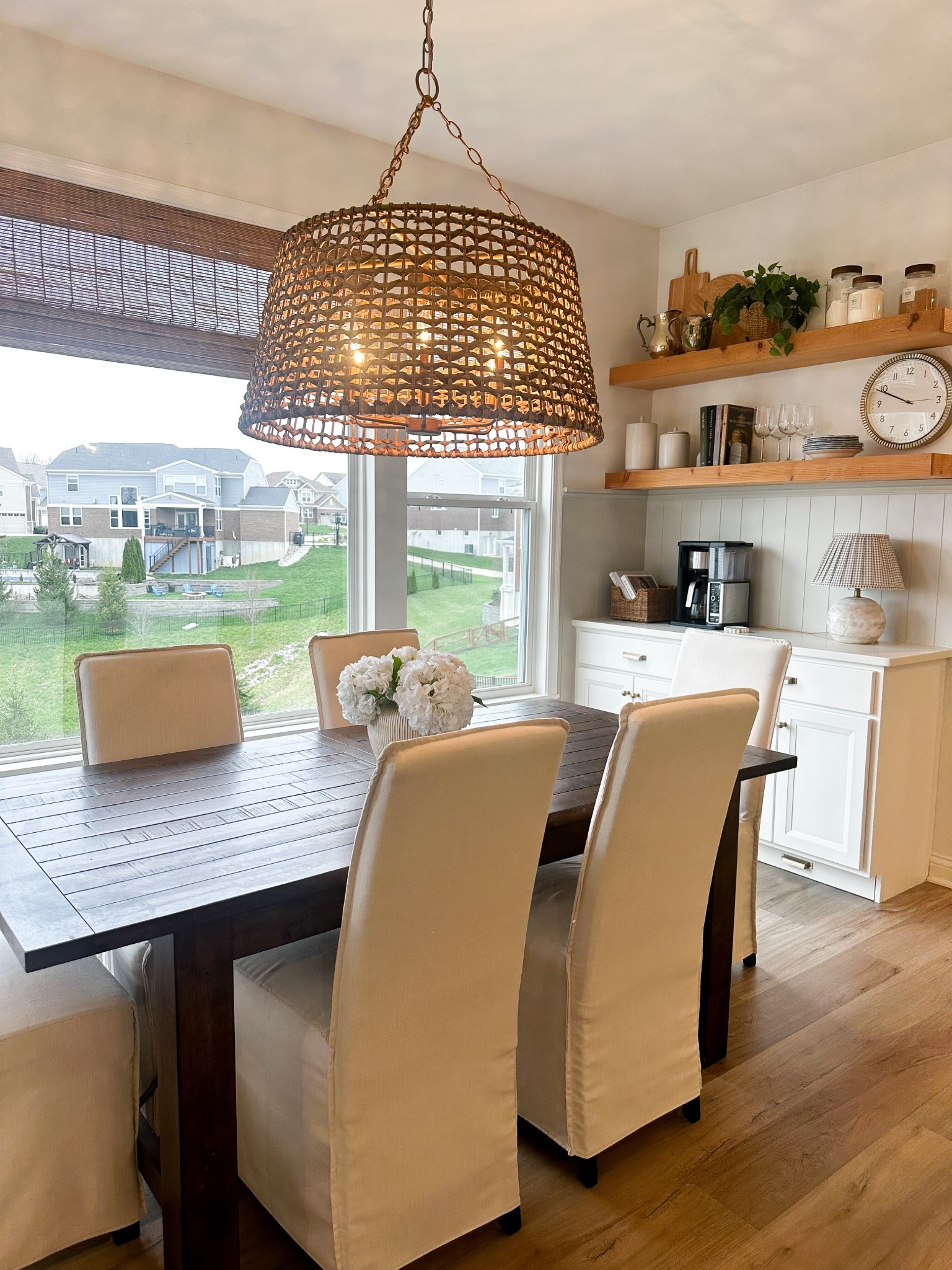 Dining room, poppy chandelier, Ballard designs, pearson chair, floating shelves decor, woven blinds 

#LTKHome