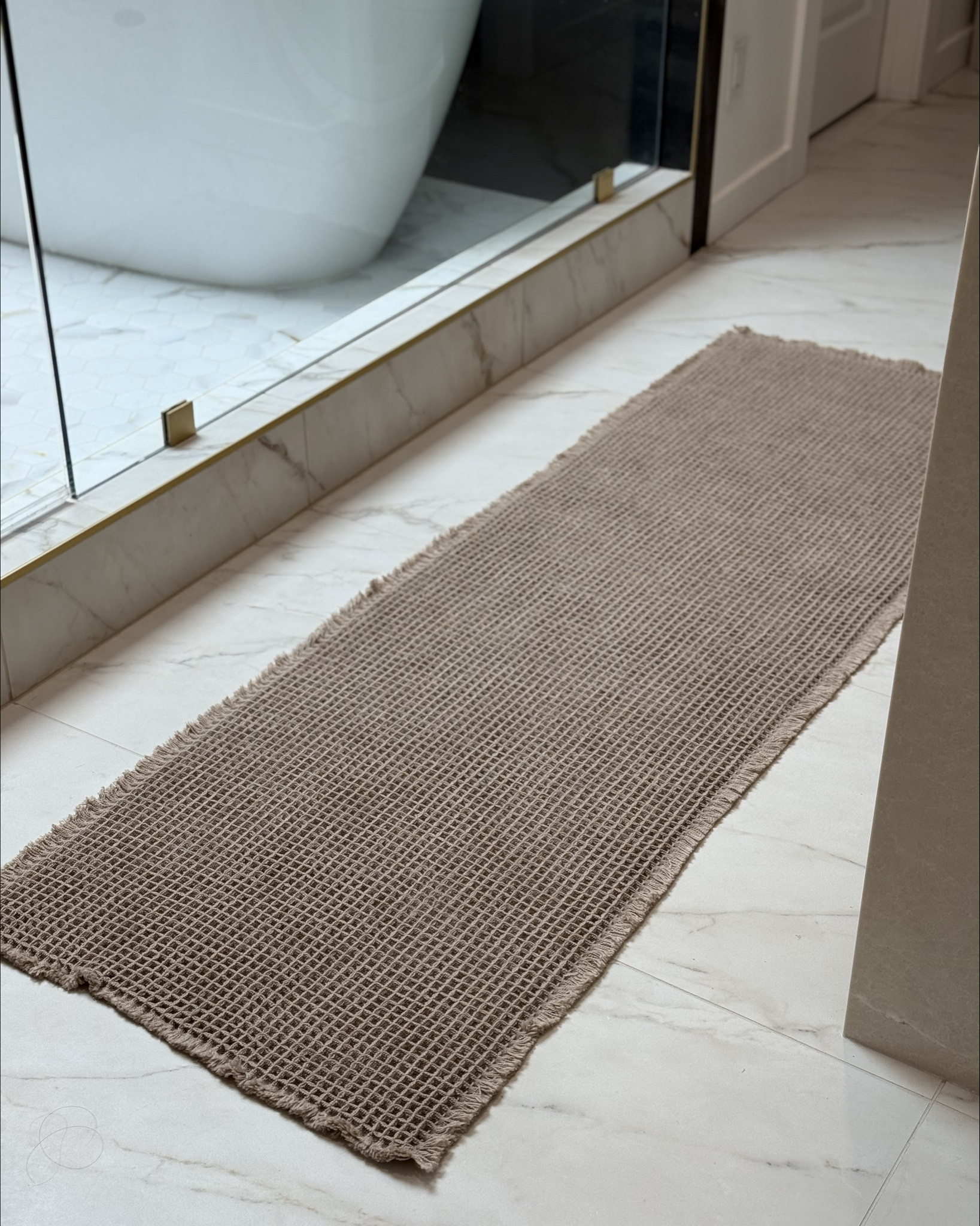 On the hunt for a simple bath mat? This one is it. Perfect color, it’s soft and cushy, love the waffle texture with the fringe edges, AND the back side is non-slip! 

#LTKHome #LTKFindsUnder50