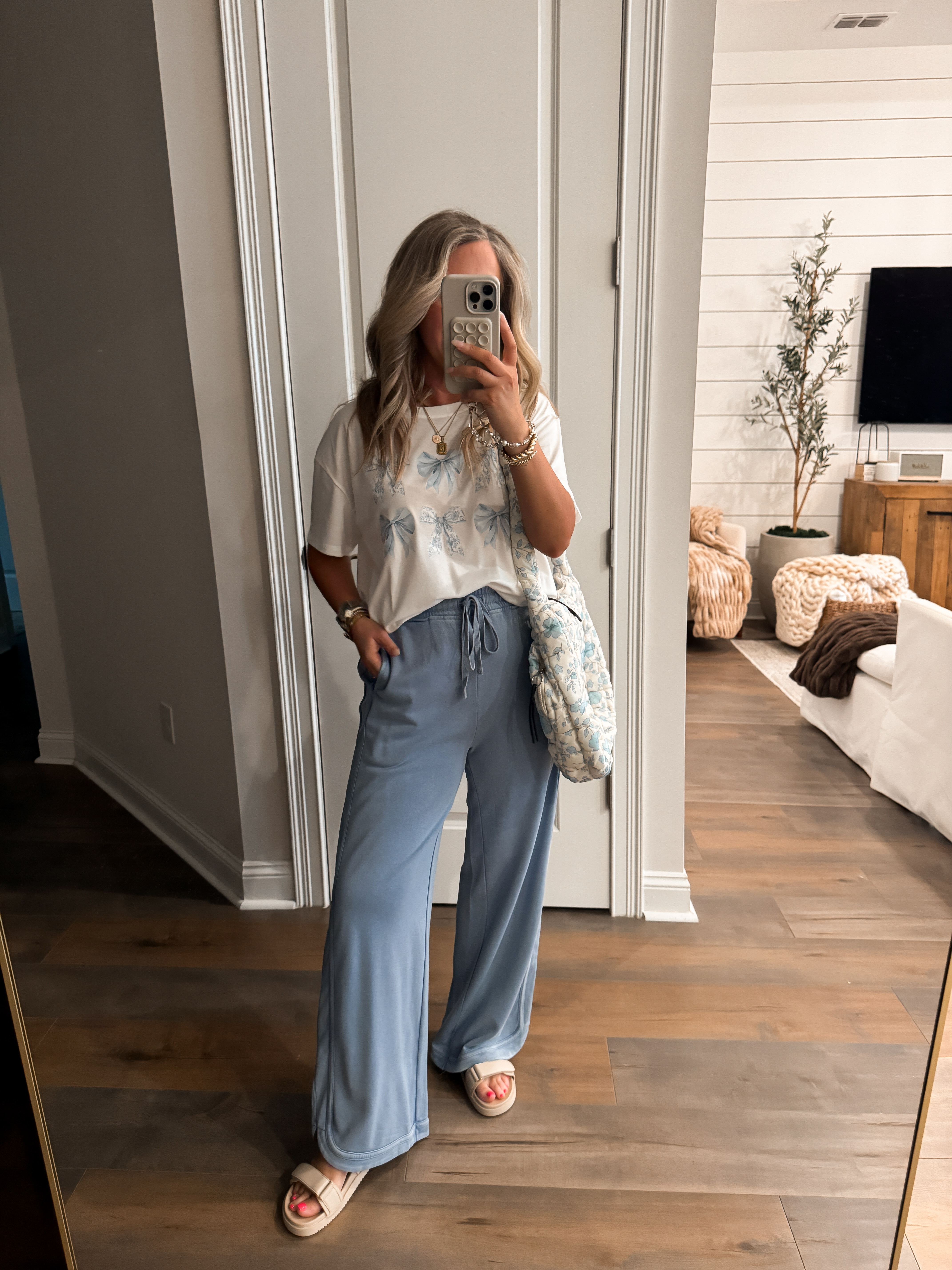 A little bow moment with a cozy twist. 💙
Mixing soft, feminine details with laid-back staples because mom style can be cute and comfortable! Wearing size M.

Amazon fashion, bow t-shirt, coquette style, mom style, blue sweatpants, casual cute, feminine details, cozy outfit, everyday style, quilted bag, floral bag, relaxed chic, effortless outfit, soft style, comfy look 

 #LTKootd #LTKmomlife #LTKActive