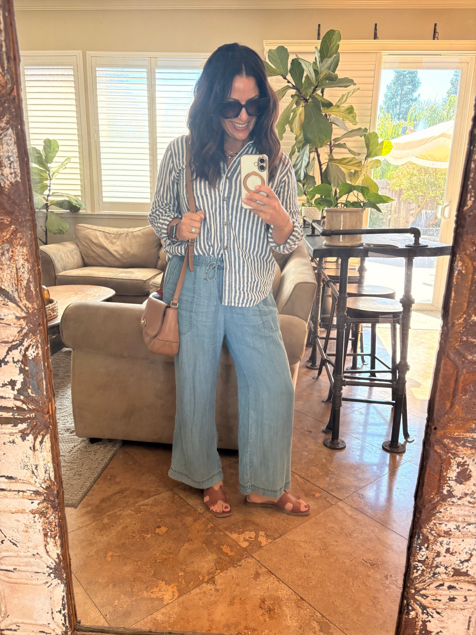 No sports today! Lunch with the fam and errands. It’s warm and sunny, wearing tencel pull on pants and an easy striped button up. 

Weekend style 

#LTKStyleTip #LTKOver40 #LTKPetite