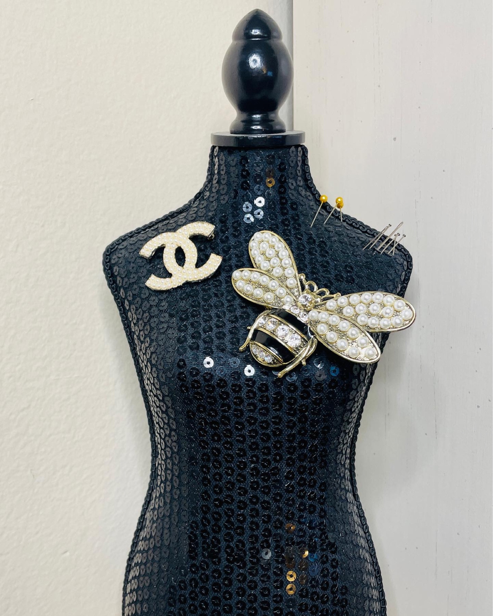 Fun way to store your brooches- on a pinable mannequin or throw pillow! Linked a couple options from Amazon and you can find more brooch outfit ideas on the blog!

#LTKstyletip #LTKbeauty #LTKfit