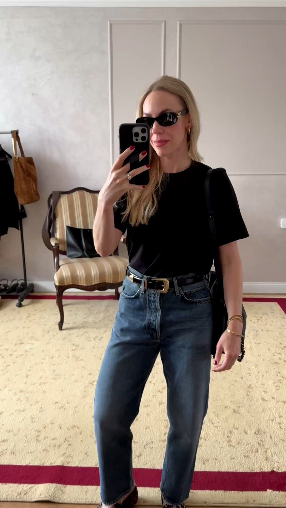 Casual spring outfit, spring outfits 2026, tee and jeans, black tee, AGOLDE 90’s jeans, leopard print ballet flats, Loewe Flamenco pouch handbag 

#LTKOver40 #LTKootd #LTKSeasonal