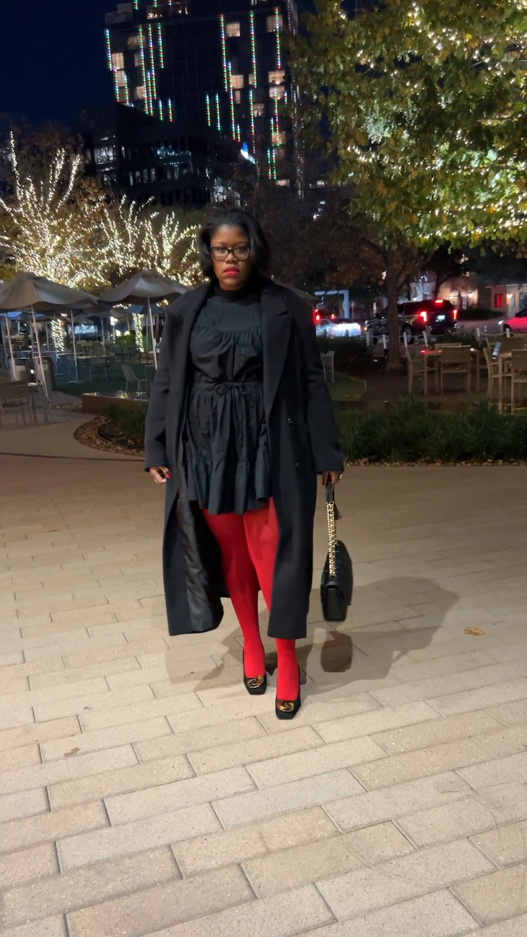 This outfit is from two years back, but it’s a perfect reminder that great holiday looks don’t expire. I love mixing classic black layers with a bold pop of color — red tights instantly make the look feel festive without being overdone.

If you have similar pieces in your closet, this is an easy outfit to recreate for the holidays: a statement coat, a simple dress, bold hosiery, and a chic bag. Sometimes it’s just about styling what you already own in a fresh way.

Sharing older looks like this to show how versatile classic pieces really are 🤍✨

#LTKSeasonal #LTKPlusSize #LTKHoliday