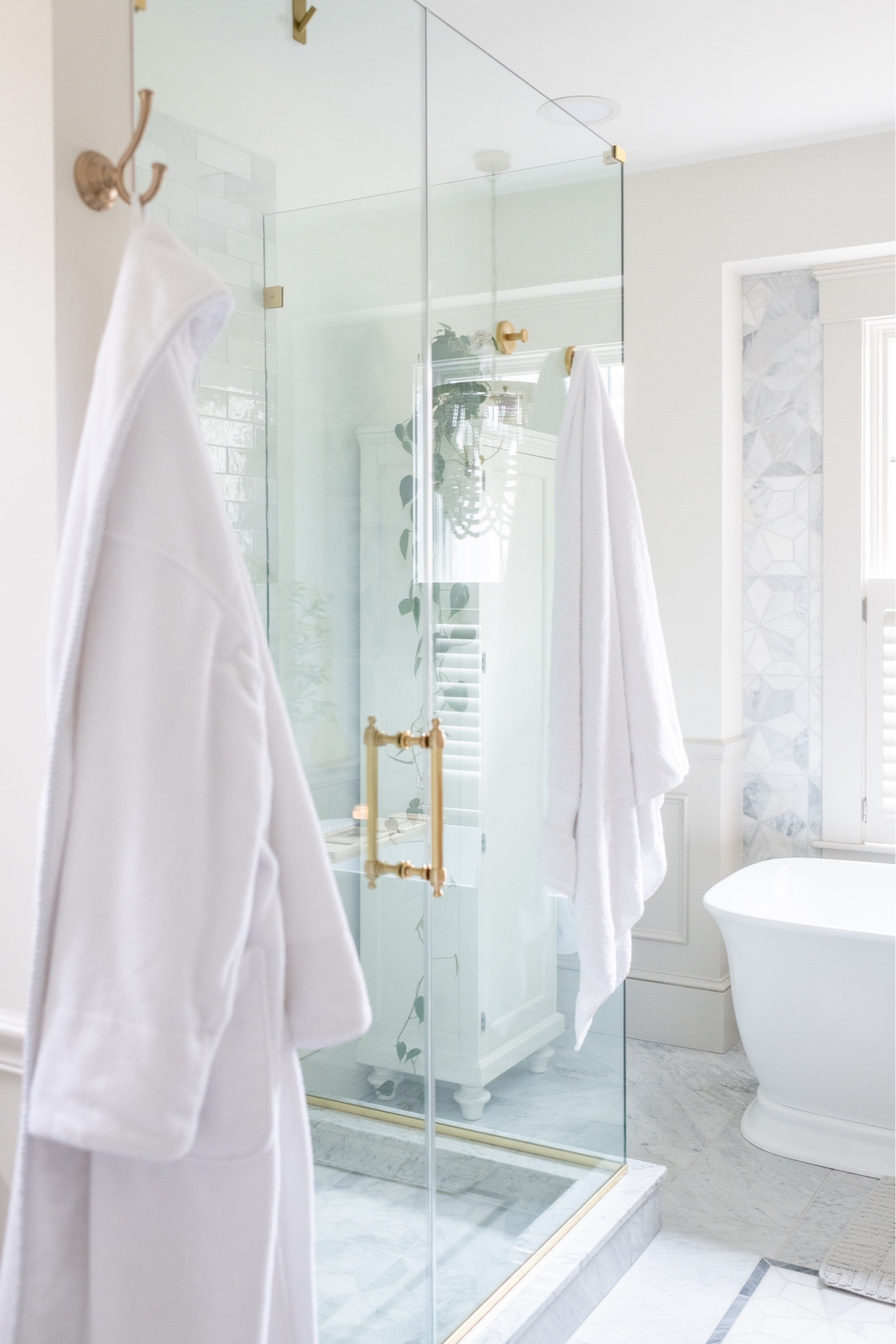 “It is beautiful, but where do you hang towels?” It’s true that we didn’t build a ton of towel storage into our new bathroom initially, but we always planned on adding storage later on with these suction cup brass hooks and even an over-the-shower-glass hook (which usually lives around the corner, but I moved it here to show you). 

#LTKhome