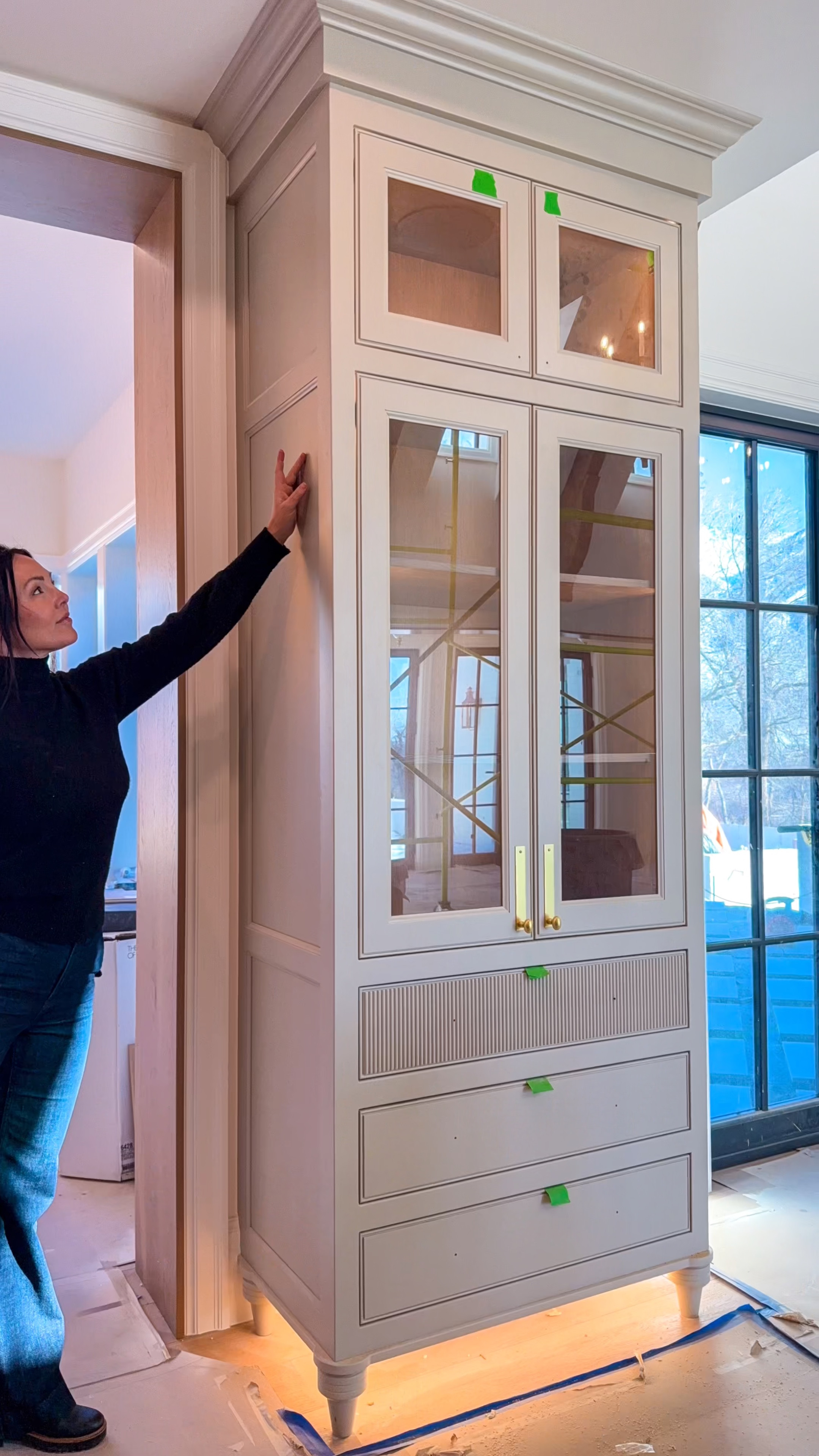 New kitchen progress tour! 
Aged brass hardware and fluted white orb pendants linked 
Custom stain 
Fridge freezer columns are sub zero 
Marble countertops Calacatta borghini from bedrosians tile.  

#LTKHome