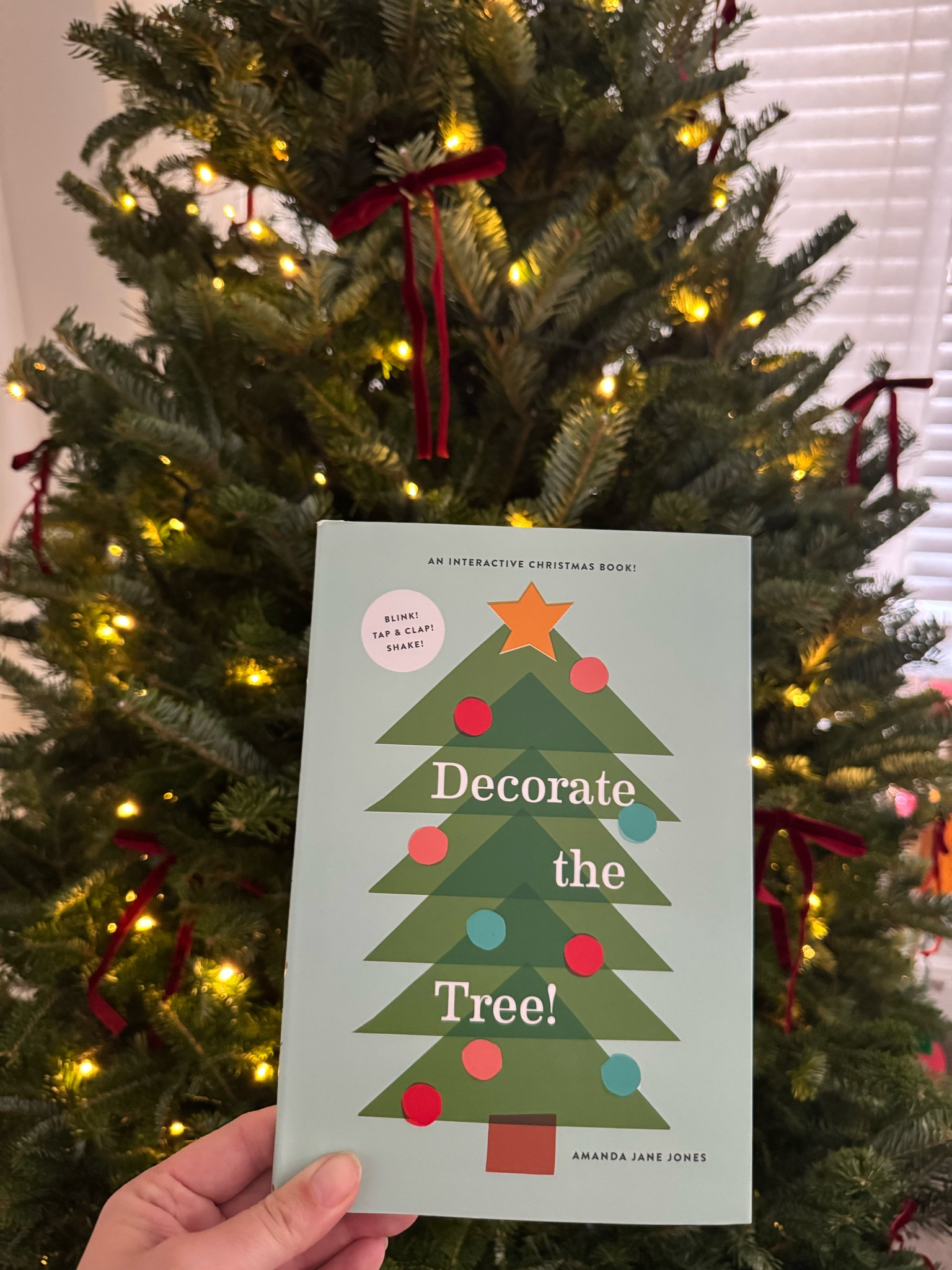 We love this cutsie interactive Christmas book!  Clap, tap and sparkle with your little one while you decorate the tree  🎄 

#LTKKids #LTKFindsUnder50 #LTKHoliday