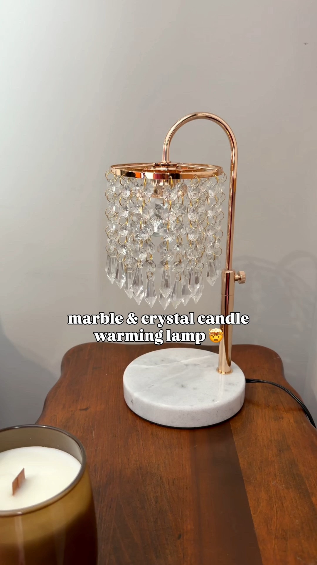 Candle warming lamp that looks like a crystal chandelier + a marble base!

#LTKHome