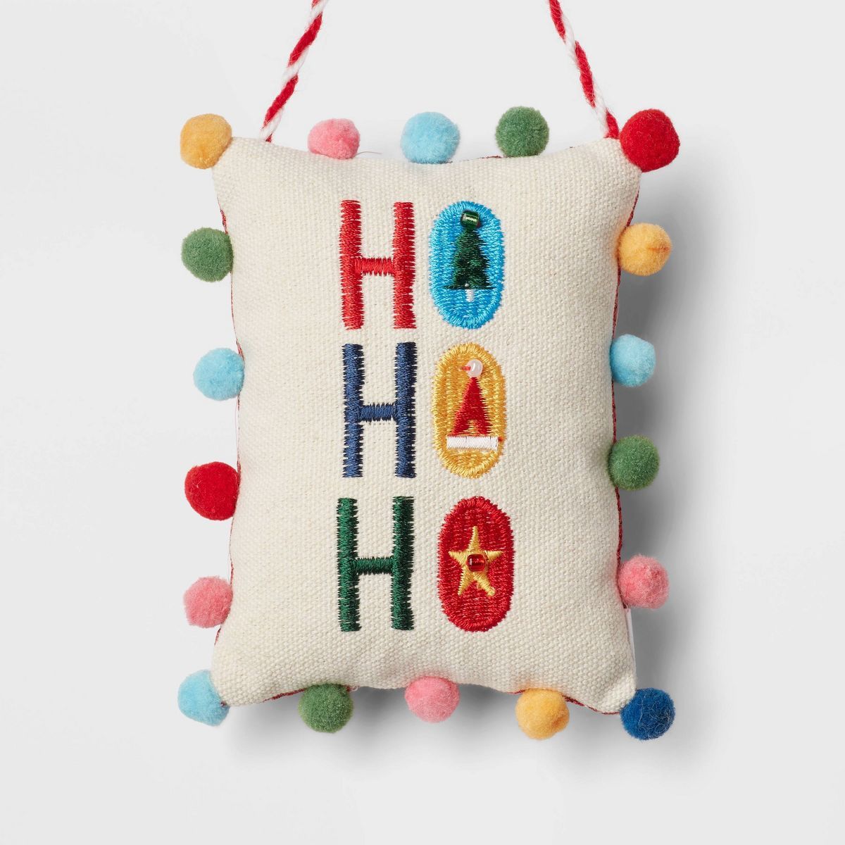 Fabric Embroidered 'Ho Ho Ho' Pillow with Colorful Pom Poms Christmas Tree Ornament White - Wonde... | Target