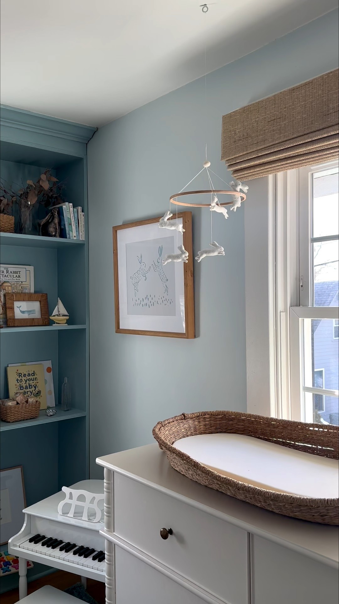 We easily moved from nursery to toddler space through this paint update. The blue on blue layer feels grounded, but youthful. Maybe one day we’ll take the bunny mobile down, but this space already feels night and day 😅 

Walls: Lookout Point by Benjamin Moore
Shelves and Cabinet: Cabe Blue by Benjamin Moore

Shop the entire space by commenting BLUE 