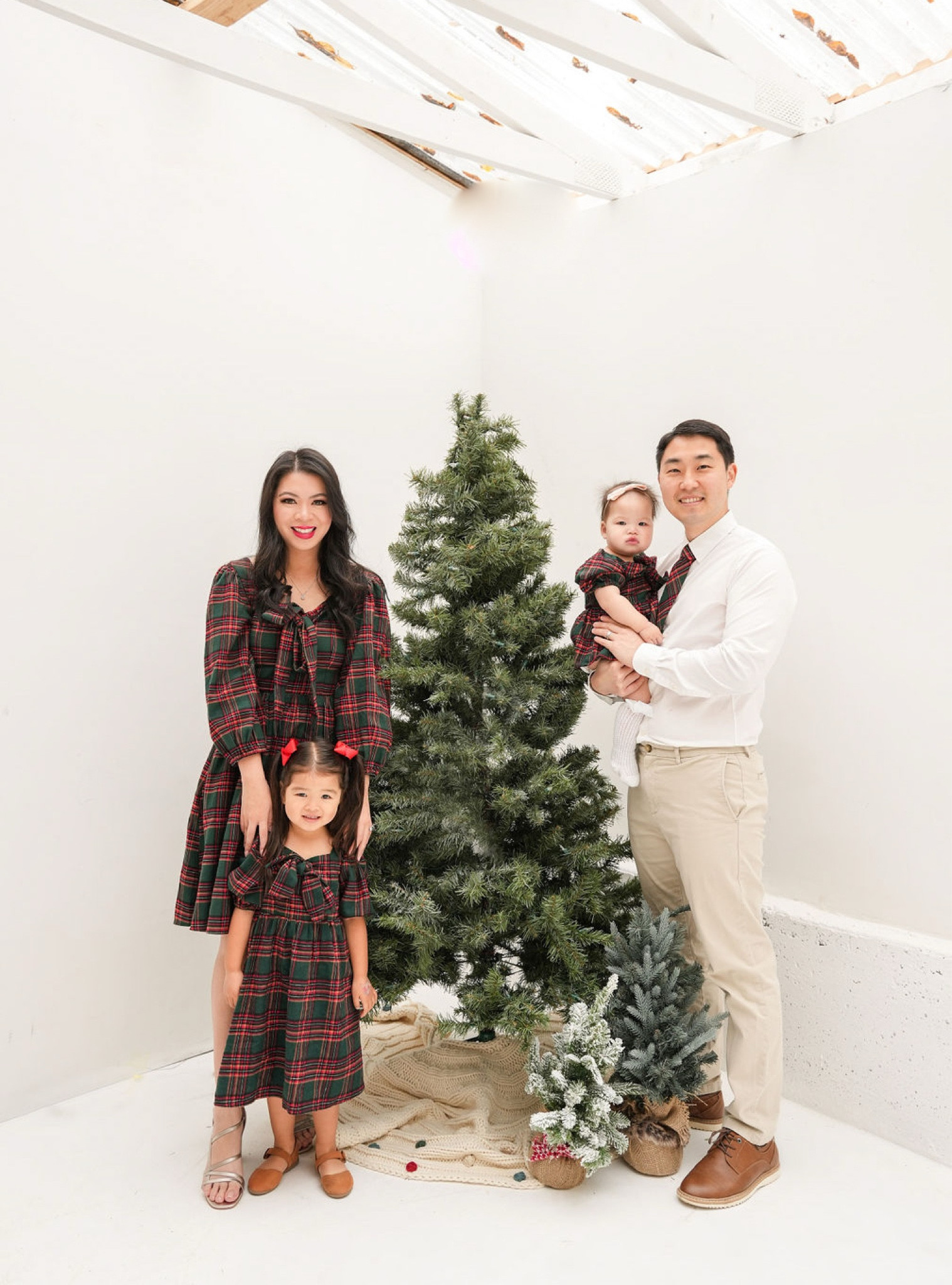 Holiday matching family outfits for holiday photos, Holiday dress, midi dress green and red plaid print with bow and puff sleeves. Code 15TINABIT gets you 15% off at Ivy City Co

Runs large so size down! I’m wearing an XS when I’m usually a Size S 

#LTKStyleTip #LTKFamily #LTKHoliday
