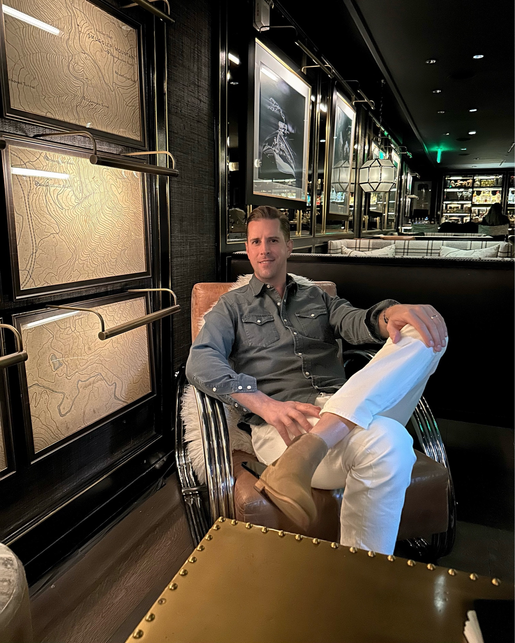 Thomas Jamieson wears a chambray button down shirt and bone colored jeans with boots in Aspen. Men’s fashion, menswear, what to wear in Aspen. Chelsea boots, suede boot. 

#LTKSeasonal #LTKmens #LTKshoecrush