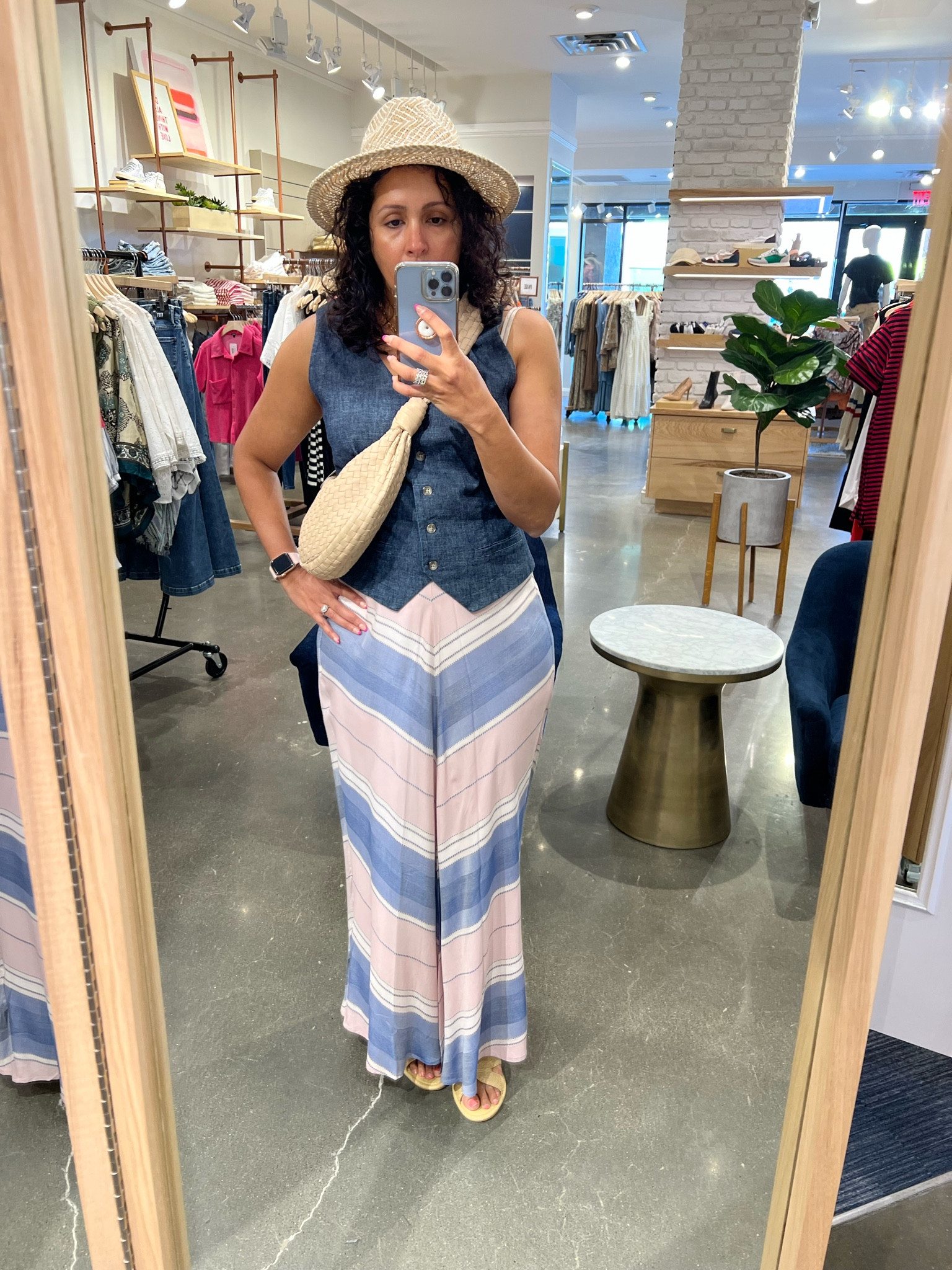 Summer doesn’t always have to means shorts and a white tee!  Especially if you don’t wear shorts! Skirts are a great option.

I especially love this lightweight one and it can be worn with this adorable denim vest or a white button up shirt -swipe to see. 
You can also pair with a basic grey tee.

And don’t forget cute accessories to complete the look! Accessories don’t always mean jewelry. Here I’ve finished the look with a textured bag in a fortune cookie shape and a straw hat!
My skirt is now on a-a-l-e and I’m hooking you up with all the deets.
Are you a fan of skirts, tell me below. 

#LTKsalealert #LTKFind #LTKunder100