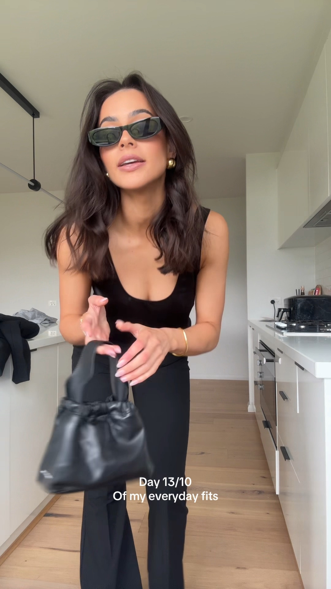 All black outfit. Tank top. Boot leg pant 

#LTKdatenight #LTKaustralia #LTKstyletip