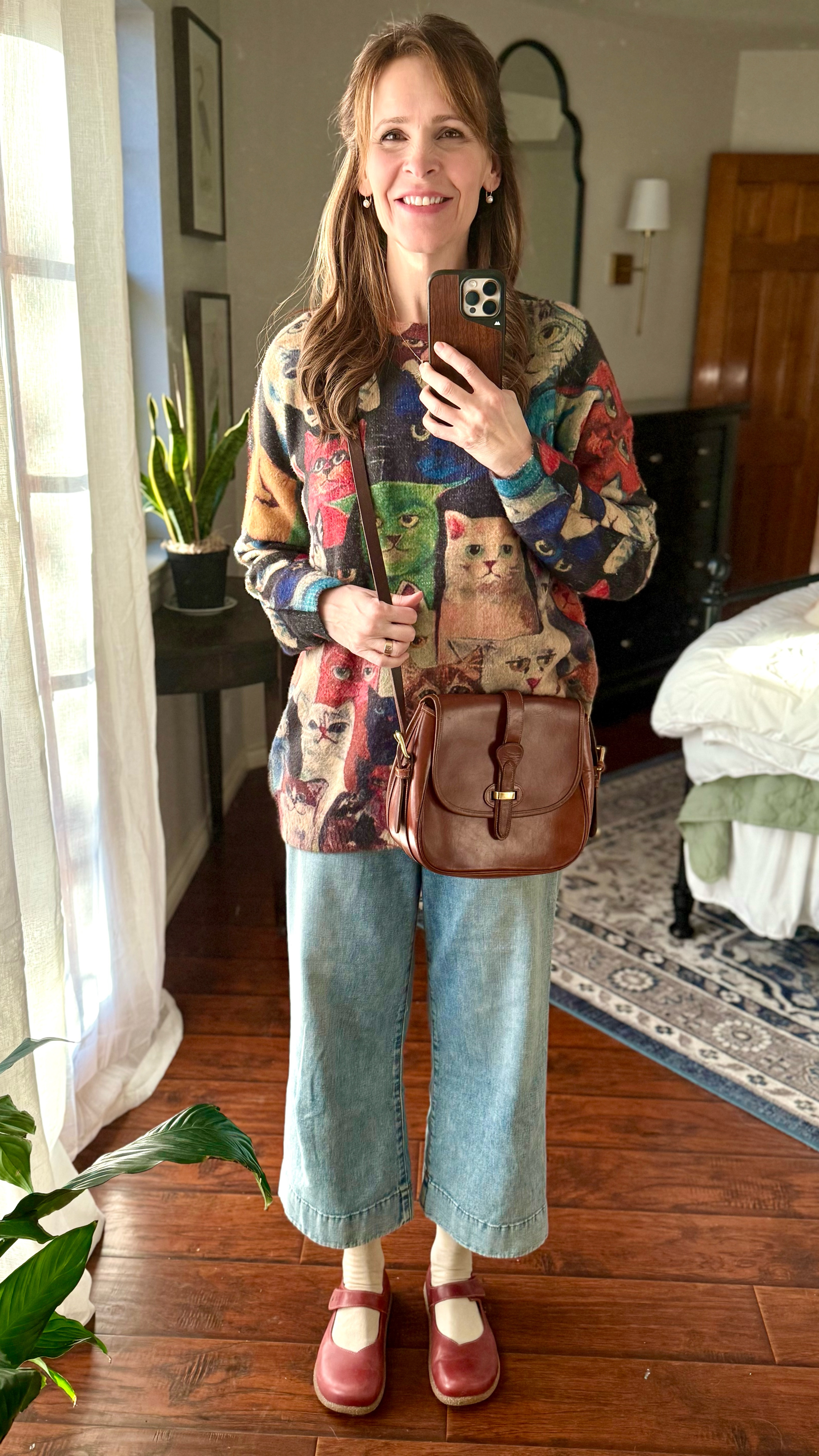One could argue “cat lady” might not be the desired vibe, but I’m embracing it. This sweater is too fun and soft and comfortable not to love. I also get to wear my quirky Taos Mary Jane’s which are SUPER COMFY.  And ok- maybe my cat doesn’t actually really love it, but I do  

#LTKStyleTip #LTKMidsize #LTKOver40
