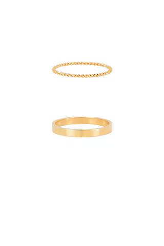 petit moments Stacker Thin Rings in Gold from Revolve.com | Revolve Clothing (Global)