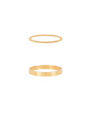 petit moments Stacker Thin Rings in Gold from Revolve.com | Revolve Clothing (Global)