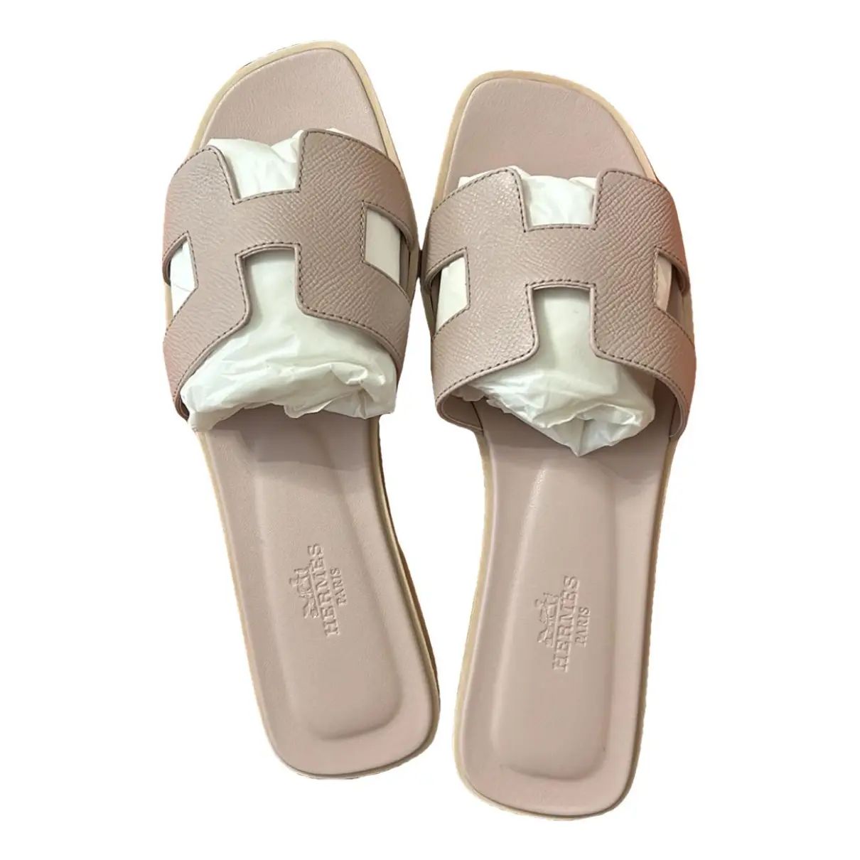 HermèsOran leather sandal37.5EUNever wornPink, Leather$880$771.10Use code COLLECTIVE15 for 15% o... | Vestiaire Collective (Global)