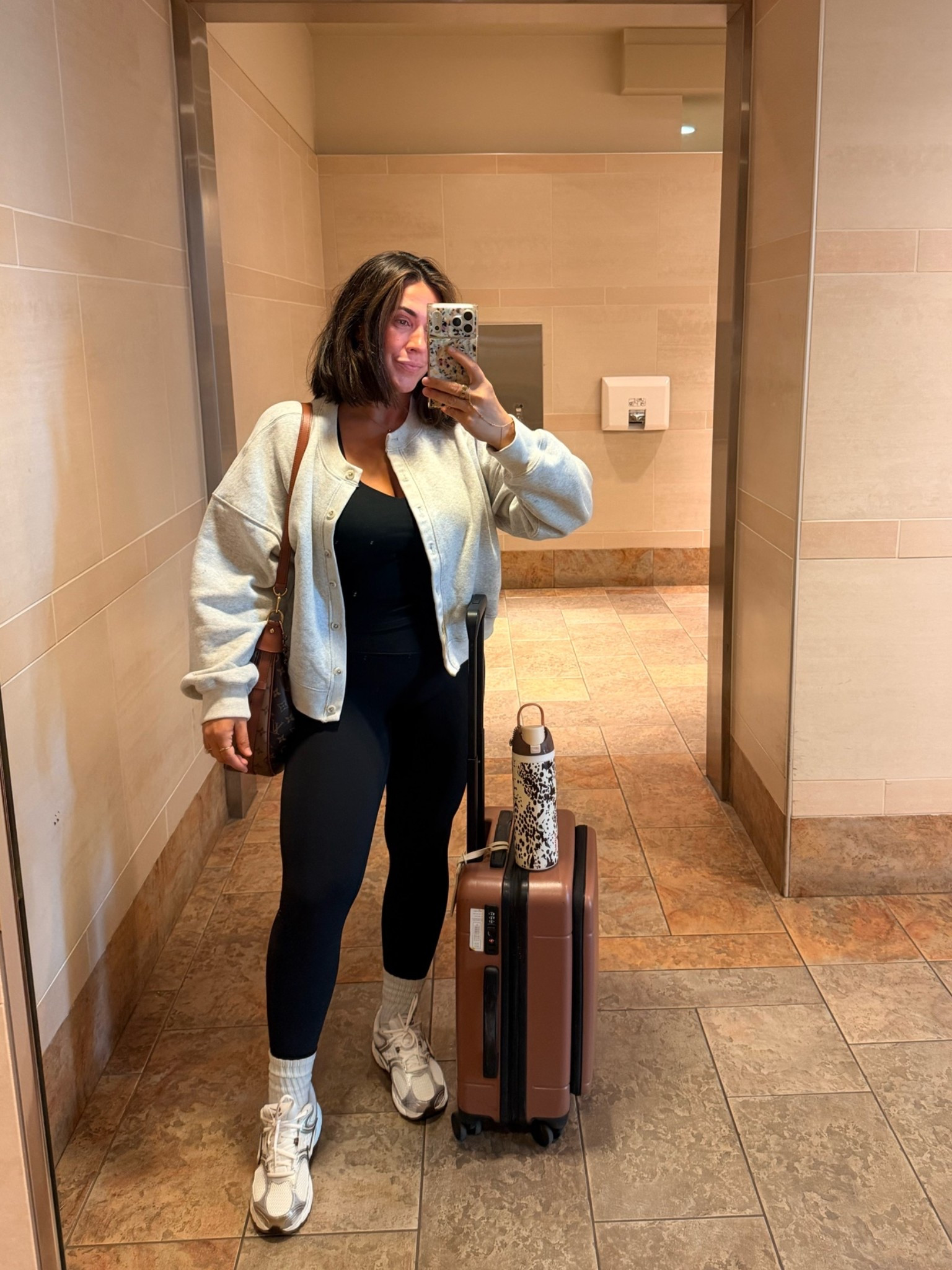 Casual fall travel outfit, leggings of course! Size L in all :) my tank has a built in bra so no bra on flight for me. Shoes are 12/10 comfy.

#LTKSeasonal #LTKMidsize #LTKTravel