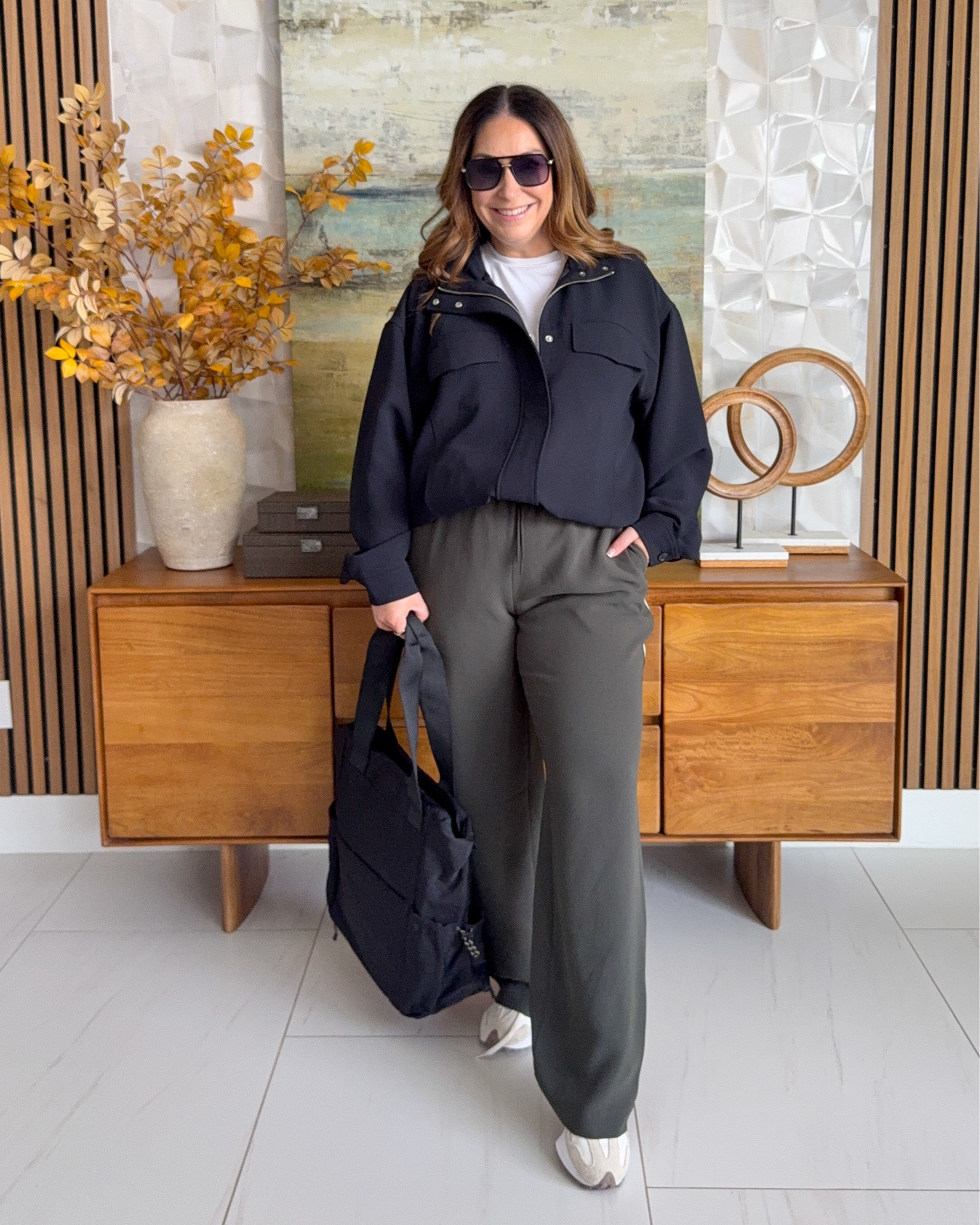 @Aritzia casual fall outfit for busy mornings! Love the crepe pants with side stripe. 

Sizing: wearing large in tee and pants but would prefer short length. Jacket size down if inbetween wearing large.

#LTKmorningroutine #LTKmomlife #LTKMidsize