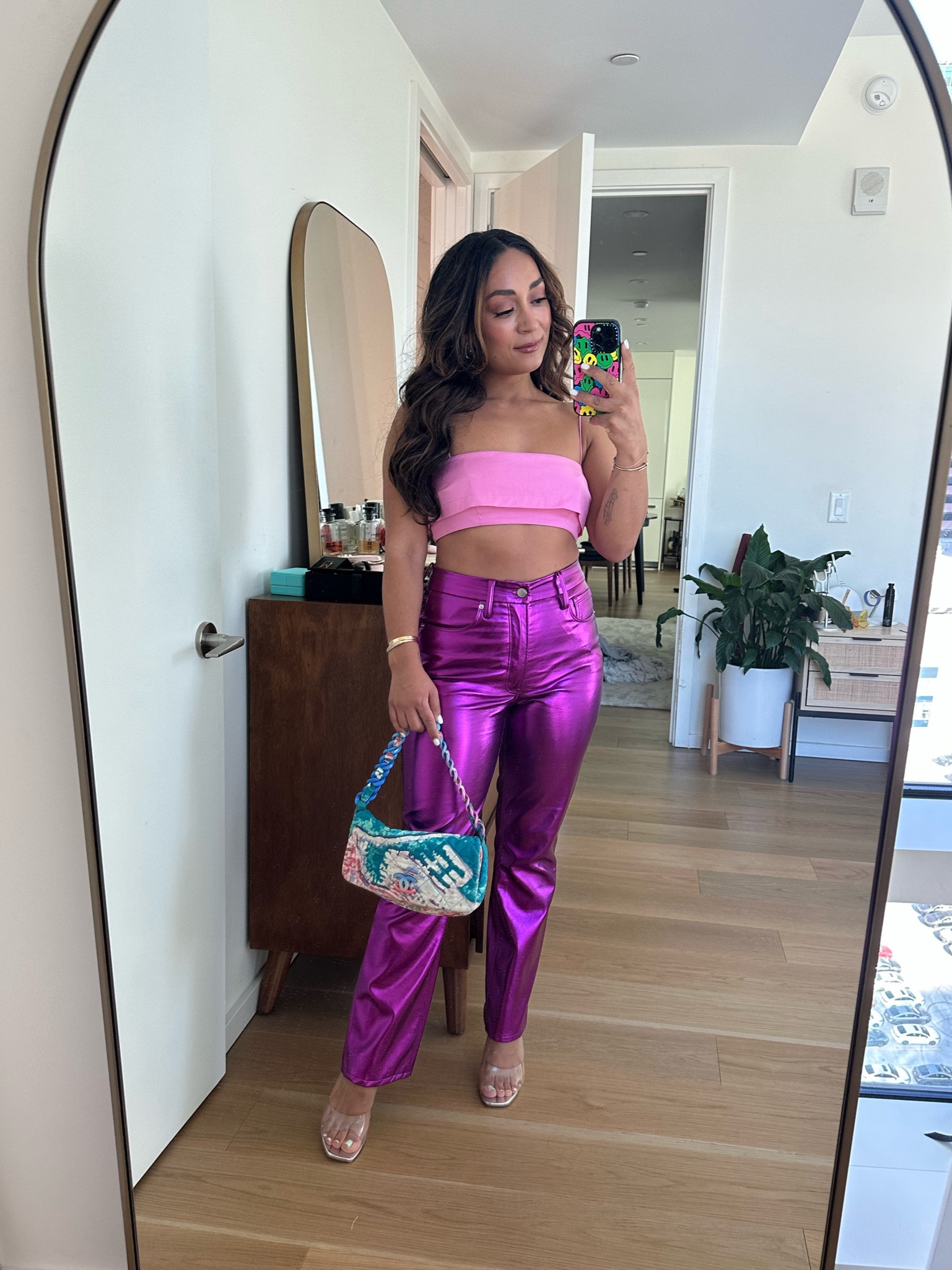Metallic pants and a pink crop top for a cute Barbie inspired look 