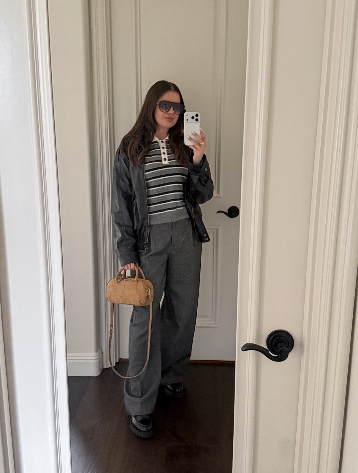 Styling a striped rugby sweater with wide leg pants, a leather bomber jacket, loafers and a suede mini bag. This Zara bomber jacket is on sale now (40% OFF!) YSL vibes on a budget! The fur collar is detachable. 
#bomber #jacket #falloutfit #rugby #polo #striped #sweater #widelegpants #leather #suede #bag #purse 



#LTKootd #LTKFindsUnder100 #LTKFindsUnder50

#LTKSaleAlert #LTKWorkwear #LTKgrwm