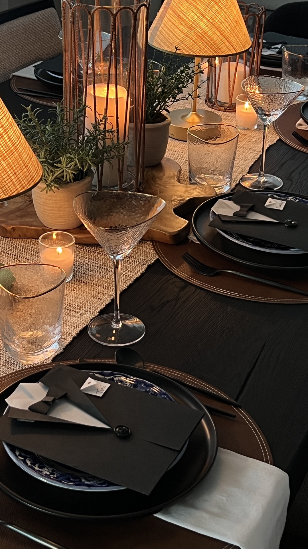 masculine tablescape, Father’s Day table, Ralph Lauren inspired table, summer entertaining, summer tablescape, dinner party decor, outdoor inspired entertaining, moody table setting, black dinnerware, matte black plates, leather chargers, blue and white transferware, chinoiserie plates, cordless table lamps, woven lampshades, textured glassware, martini glasses, cocktail hour, candlelight dinner, hurricane lanterns, wood centerpiece, neutral linens, linen napkins, layered place settings, elevated hosting, modern traditional decor, collected home style, classic entertaining, fall entertaining, autumn tablescape, cozy dinner party, hostess inspiration, modern hostess, table styling ideas, elegant tablescape, timeless table decor, entertaining at home, dining room inspiration, sophisticated hosting, layered textures, warm ambient lighting, centerpiece ideas, tablescape inspiration

#LTKHome #LTKSeasonal
