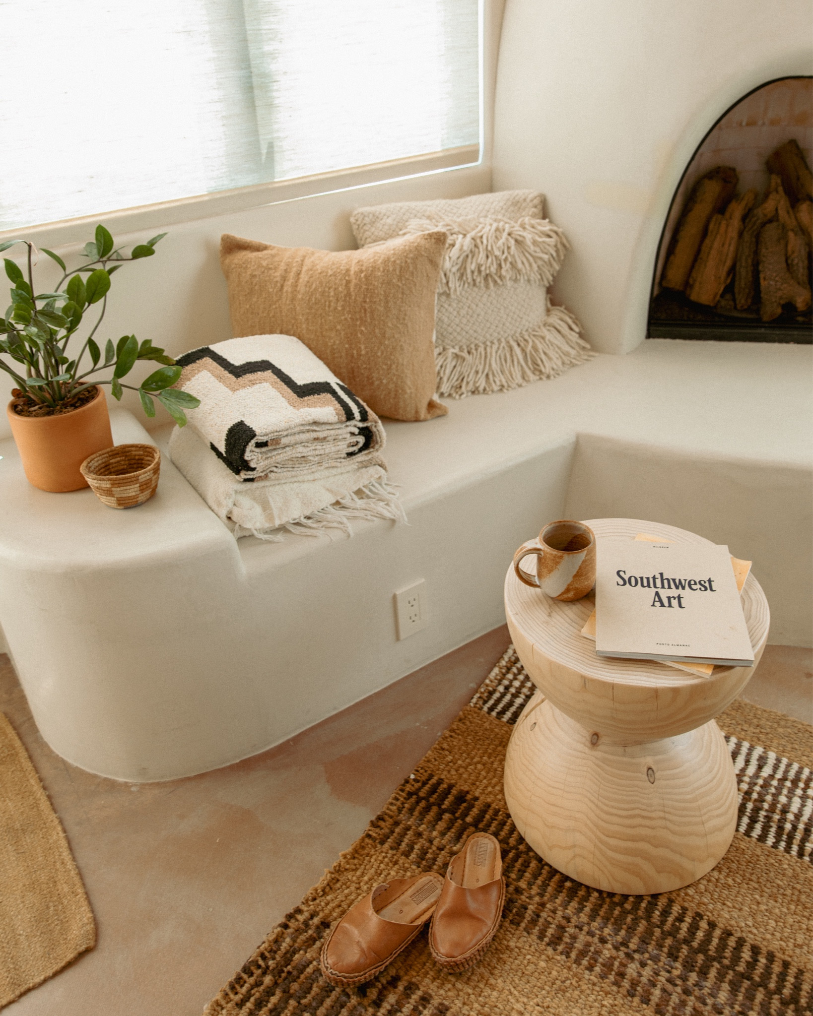 Small coffee table and boho pillows - small living room ideas - desert home inspiration - earthy living room inspiration 

#LTKunder100 #LTKhome #LTKstyletip