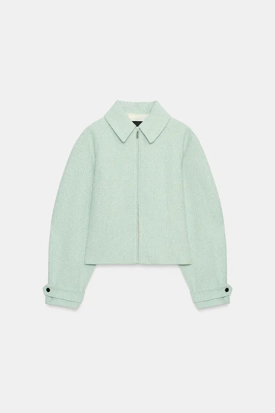 Regular collar jacket with long sleeves featuring a tab and button cuff. Front zip fastening. | Zara UK