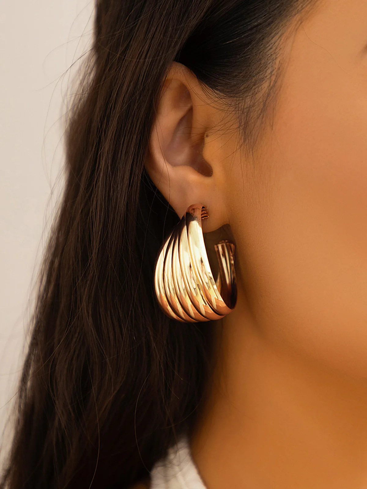 Sculpted Gold-Tone Swirl Hoop Earrings | Commense