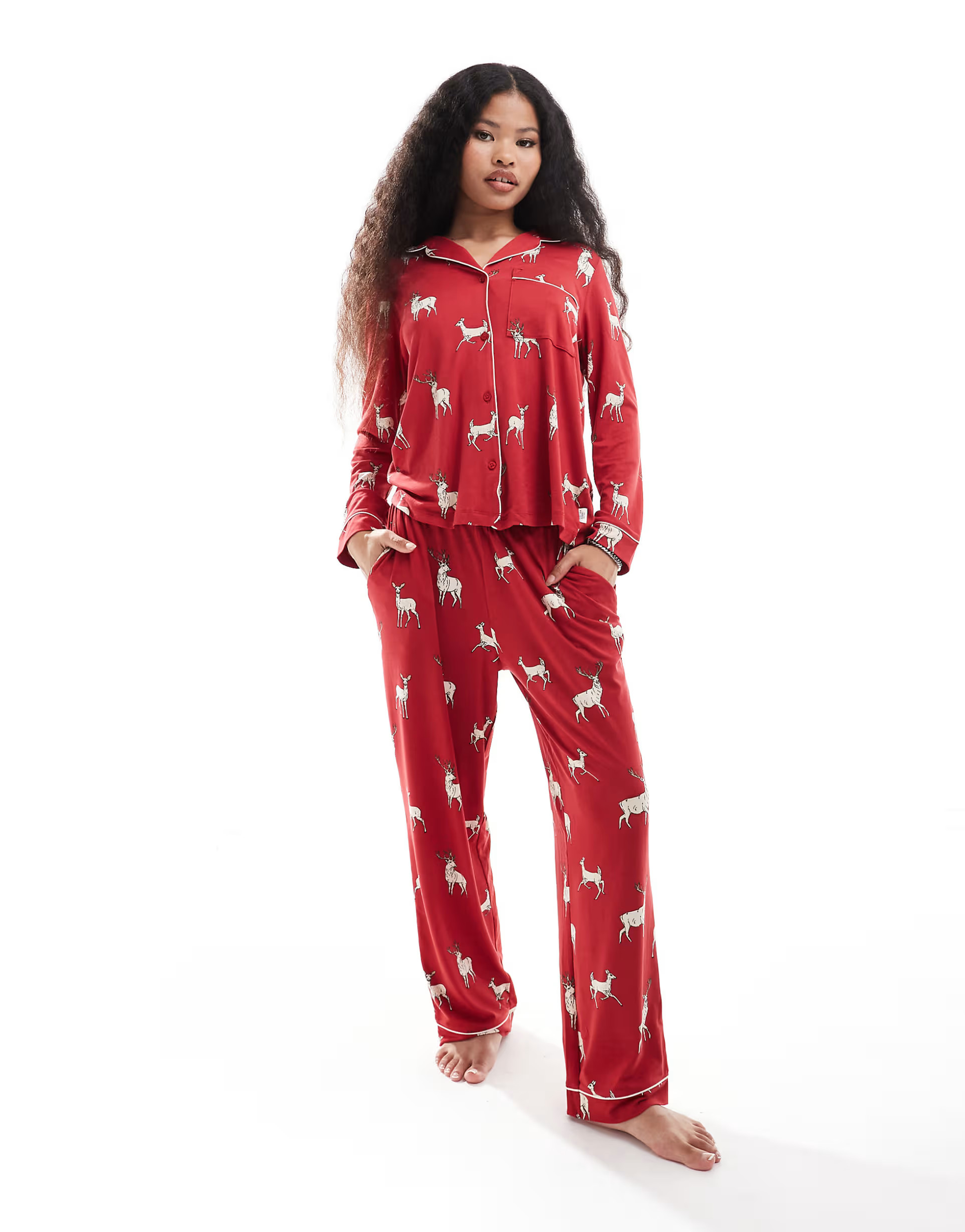 Chelsea Peers Exclusive Petite Christmas His & Hers long sleeve revere and trouser pyjama set in ... | ASOS (Global)