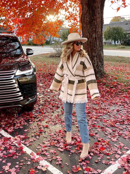 The perfect fall cardigan 🍁 

Hat outfit, cardigan outfit, striped cardigan, fall style, fall outfit, travel outfit, tan booties 

#LTKtravel #LTKshoecrush #LTKstyletip