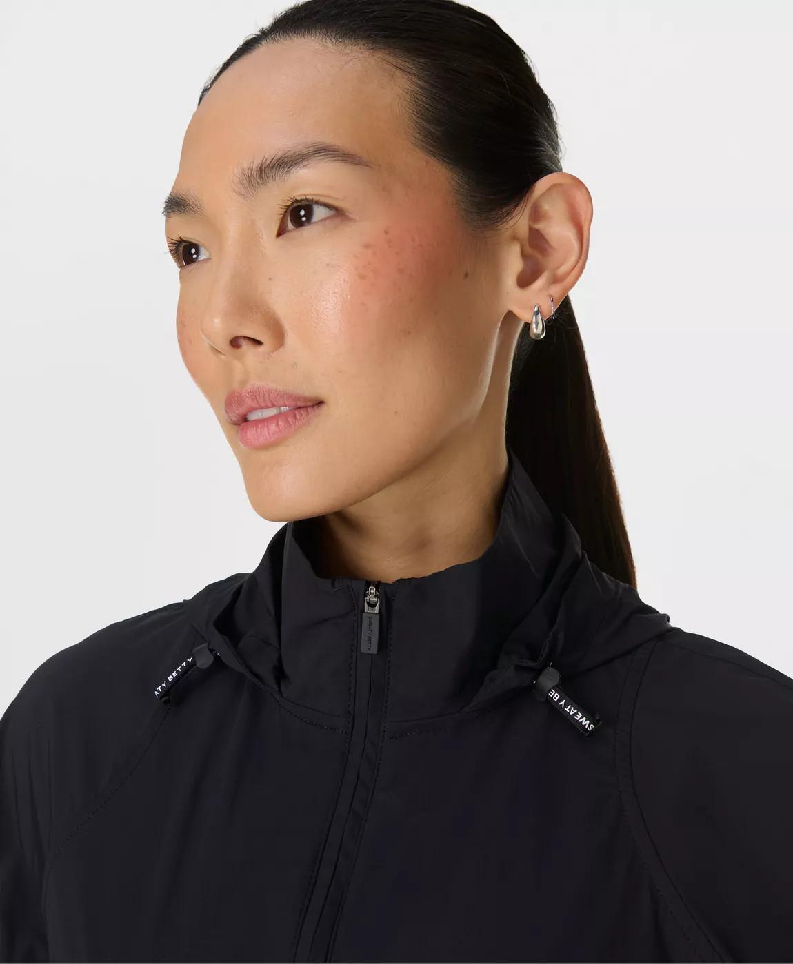 Runner's High Packaway Jacket - Black | Women's Jackets + Coats | Sweaty Betty | Sweaty Betty UK
